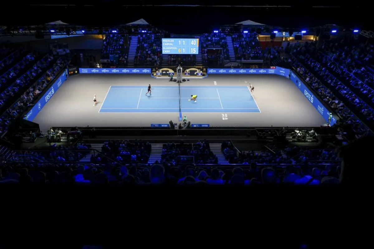 A general view shows Portugal's Francisco Cabral and Austria's Lucas Miedler playing against Britain's Julian Cash and Llloyd Glasspool during the men's final doubles match at the ATP Vienna Open tennis tournament at the Wiener Stadthalle venue in Vienna, Austria, on October 26, 2025.  TOBIAS STEINMAURER / APA / AFP