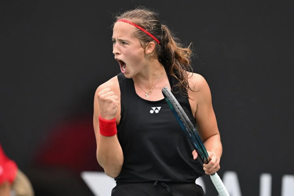 Belgium's Hanne Vandewinkel reacts during her women's singles match against China's Wei Sijia at the Billie Jean King Cup tennis play-offs at the Guangzhou Nansha International Tennis Center in Guangzhou, in south China's Guangdong province on November 17, 2024.  STR / AFP