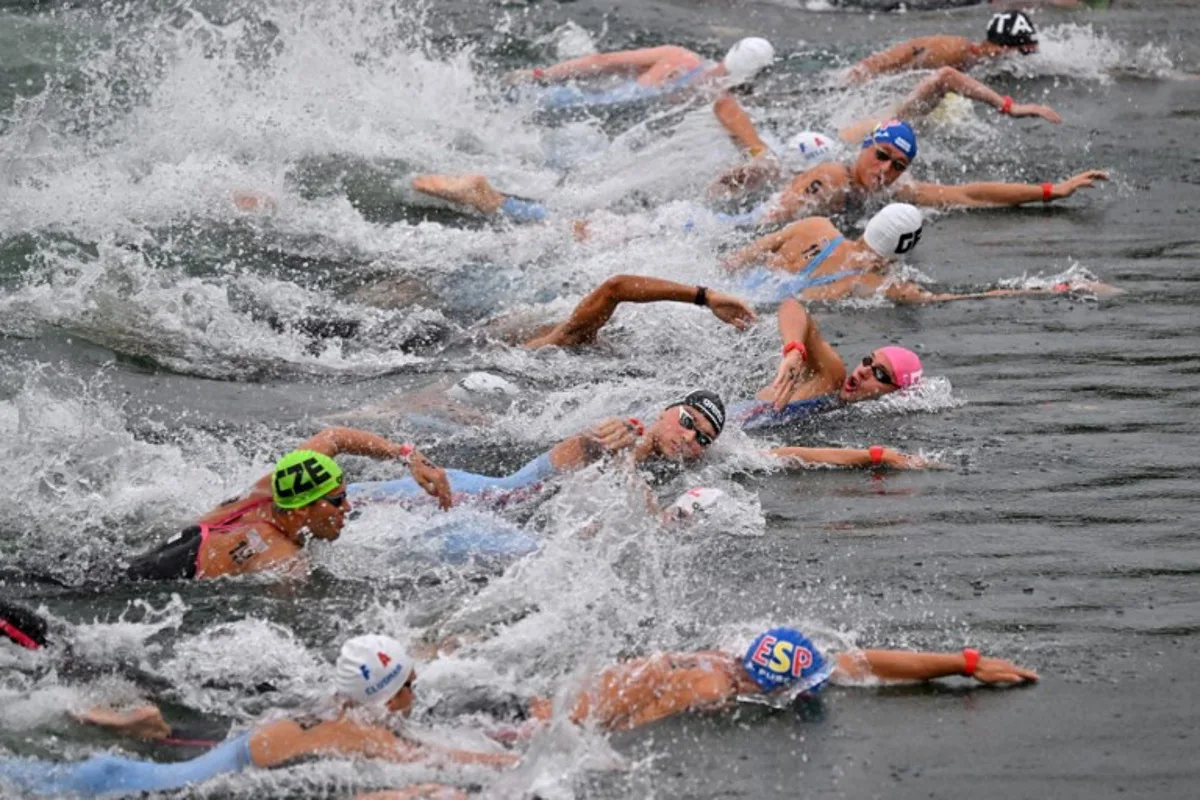 Swimmers compete in the Open Water Men's 10km race during the LEN European Aquatics Championships at the Ada Ciganlija lake in Belgrade on June 12, 2024. Andrej ISAKOVIC / AFP
