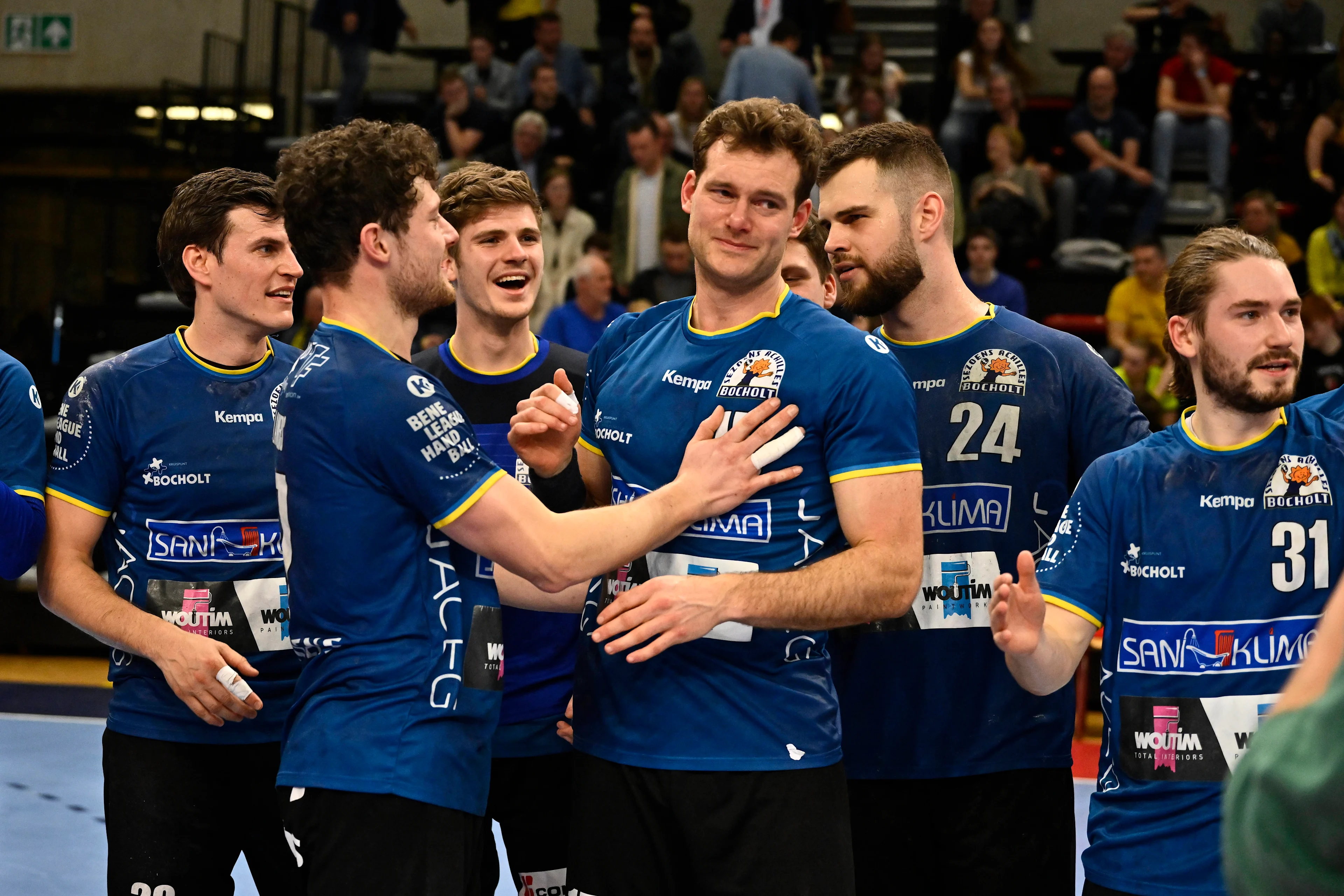 Bocholt's Joren Lamers, Bocholt's Roel Valkenborgh, Bocholt's Tim Claessens and Bocholt's Pieter Strauven celebrate after winning a game between Achilles Bocholt and Sporting Pelt, the men's final of the Belgian handball cup, Saturday 01 April 2023, in Hasselt. BELGA PHOTO JOHAN EYCKENS