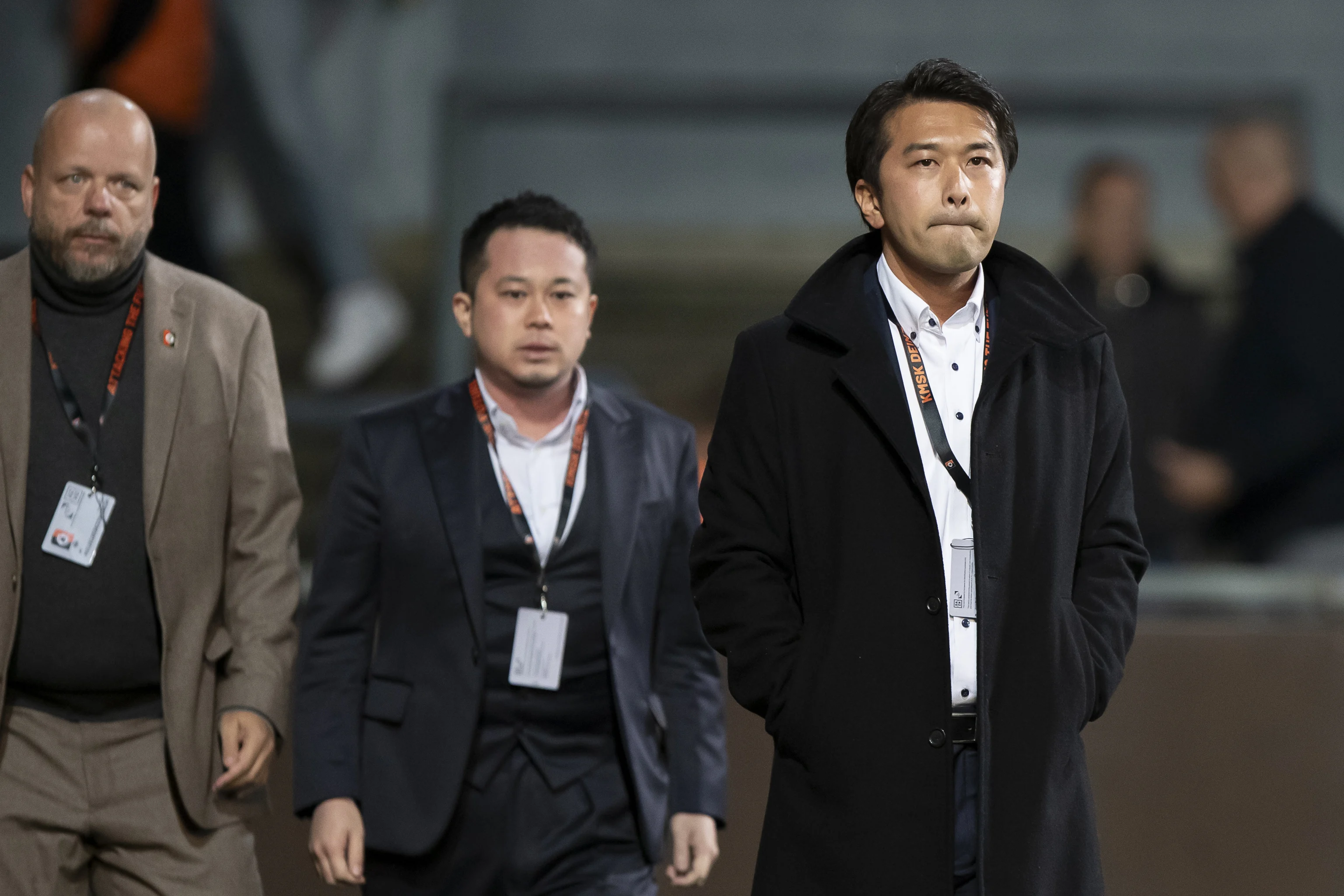 KMSK Deinze CEO Akihisa Iizuka (R) pictured after a soccer match between Lokeren-Temse and KMSK Deinze, in Lokeren, on day 6 of the 2024-2025 season of the 'Challenger Pro League' second division of the Belgian championship, Saturday 28 September 2024. BELGA PHOTO KRISTOF VAN ACCOM