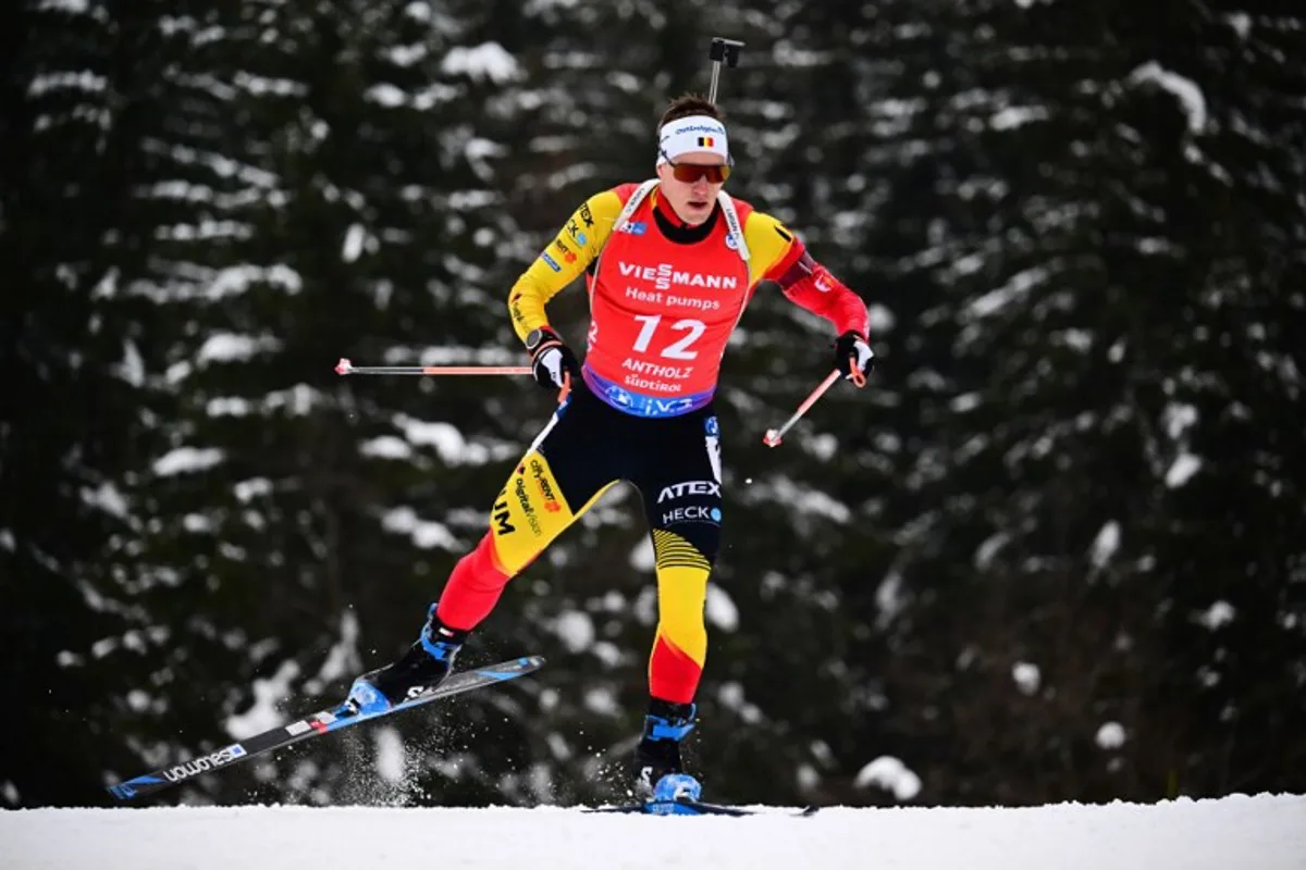 Belgium's Thierry Langer competes during the men's 15km short individual event of the IBU Biathlon World Cup in Antholz-Anterselva, Italy, on January 18, 2024.  Marco BERTORELLO / AFP