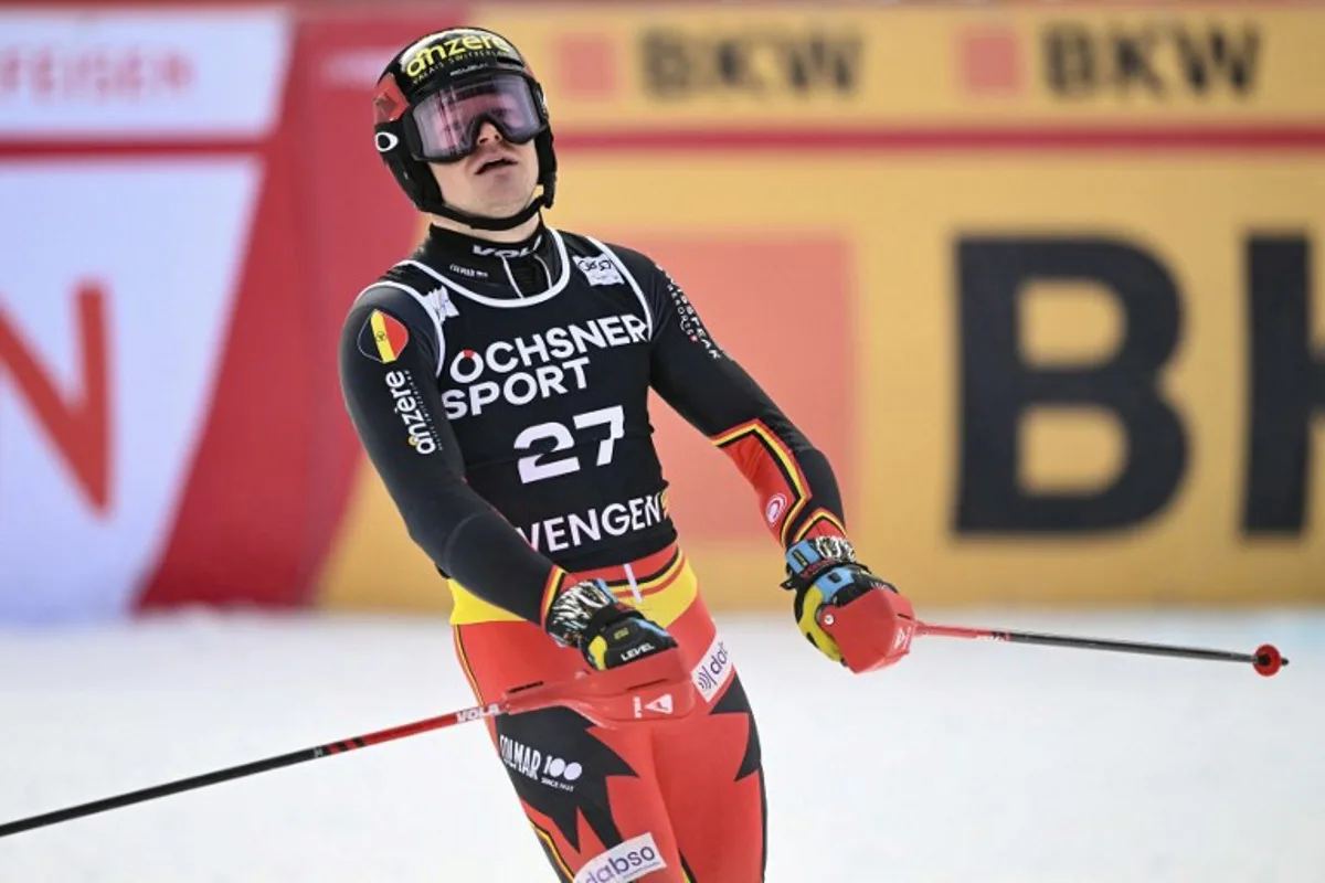 Belgium's Armand Marchant arrives in the finish area during the men's Slalom event at the FIS Alpine Skiing World Cup in Wengen on January 19, 2025.    Marco BERTORELLO / AFP