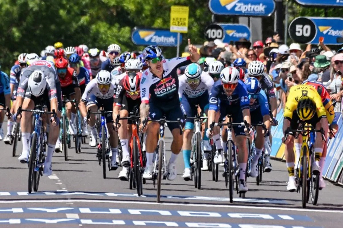 Red Bull-Bora-Hansgrohe's Australian rider Sam Welsford reacts after winning stage one of the Tour Down Under cycling race in Adelaide on January 21, 2025.  Brenton Edwards / AFP