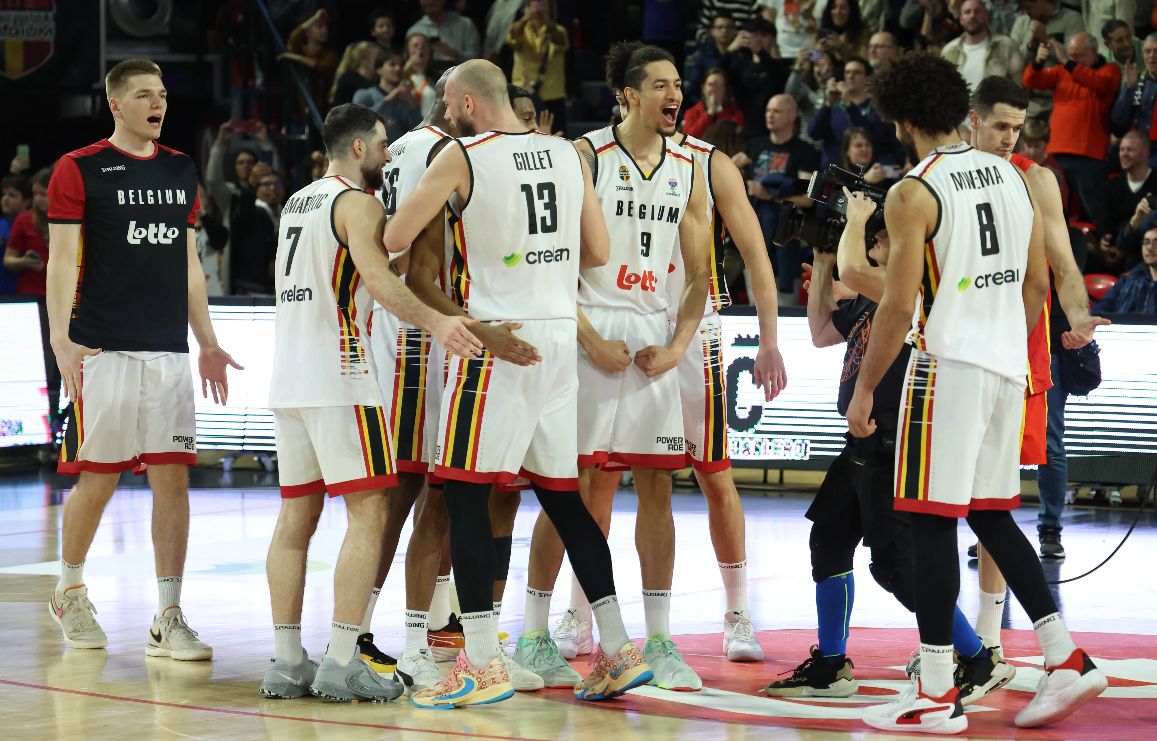 Belgium's players celebrate after winning a basketball match between Belgium's national team Belgian Lions and Spain, Sunday 25 February 2024 in Charleroi, game 2/6 in the group stage for the Euro 2025 qualifications. BELGA PHOTO VIRGINIE LEFOUR