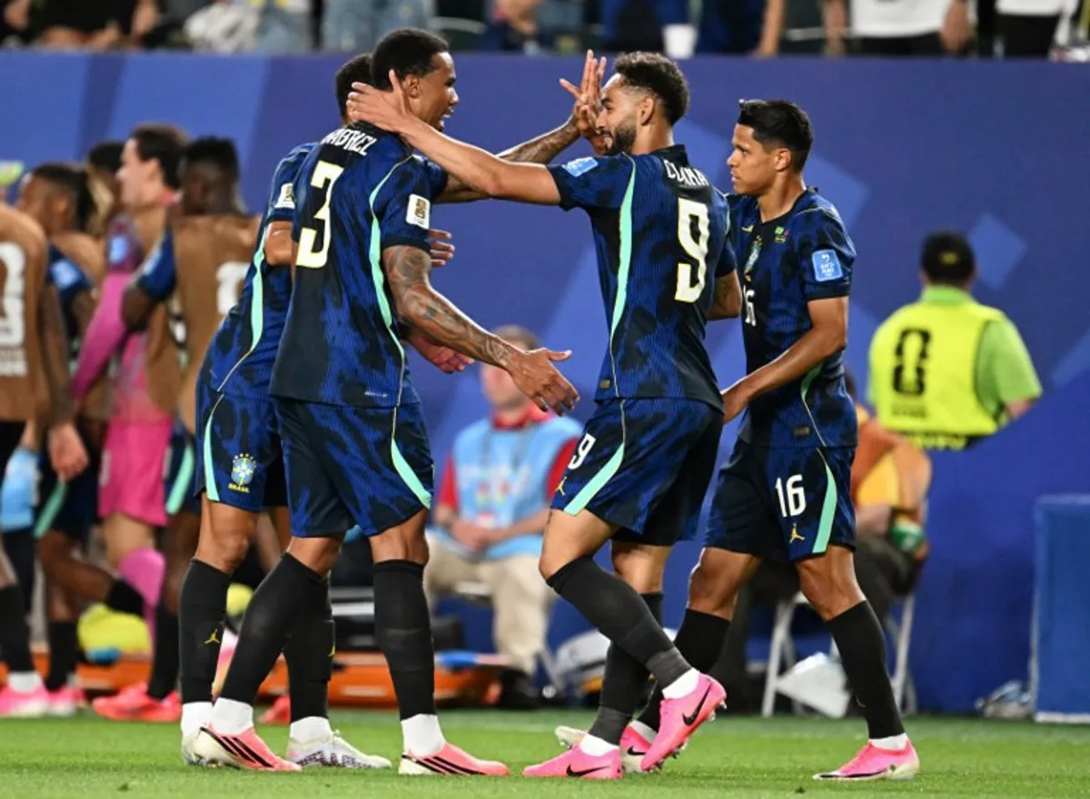 Brazil's forward #09 Matheus Cunha celebrates scoring his team's second goal with teammates during the 2026 World Cup Group C football match between Brazil and Haiti at the Philadelphia Stadium in Philadelphia on June 19, 2026. ROBERTO SCHMIDT / AFP