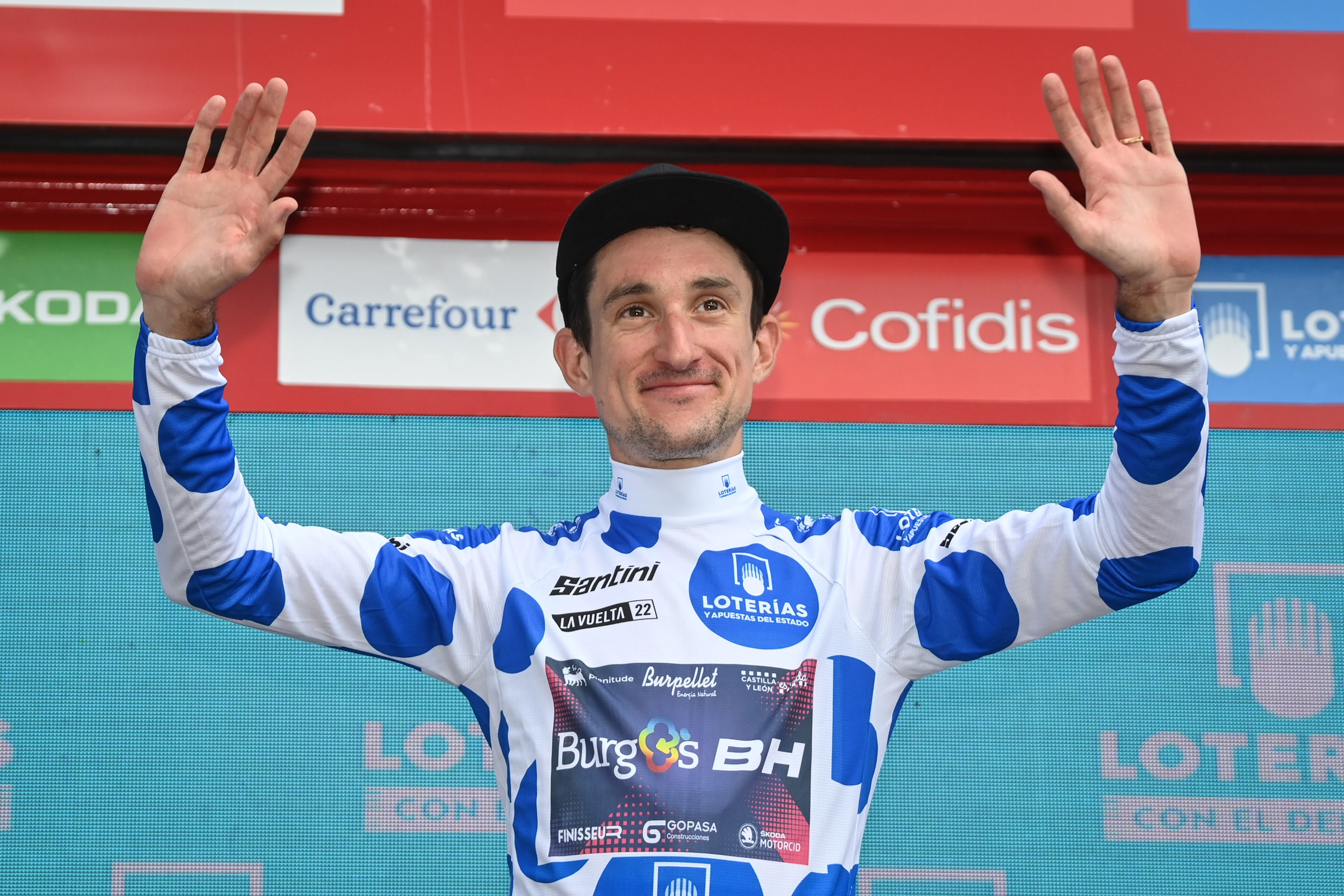 Monegasque Victor Langellotti of Burgos-BH celebrates on the podium in the polka-dot jersey for best climber after stage 7 of the 2022 edition of the 'Vuelta a Espana', Tour of Spain cycling race, from from Camargo to Cistierna (190 km), Spain, Friday 26 August 2022. BELGA PHOTO DAVID STOCKMAN