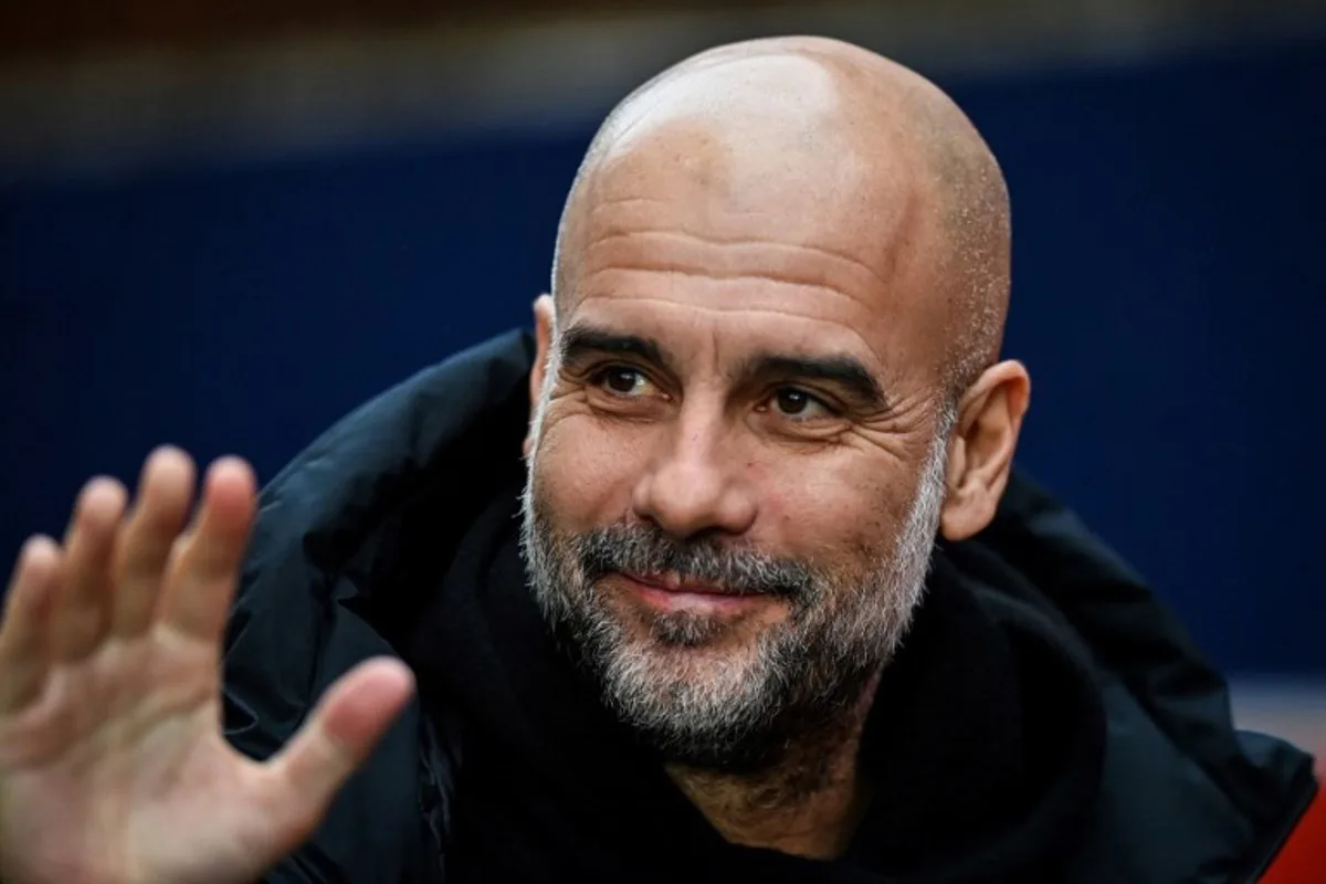 Manchester City's Spanish manager Pep Guardiola waves as he arrives prior to the English Premier League football match between Crystal Palace and Manchester City at Selhurst Park in south London on December 7, 2024.  Glyn KIRK / AFP