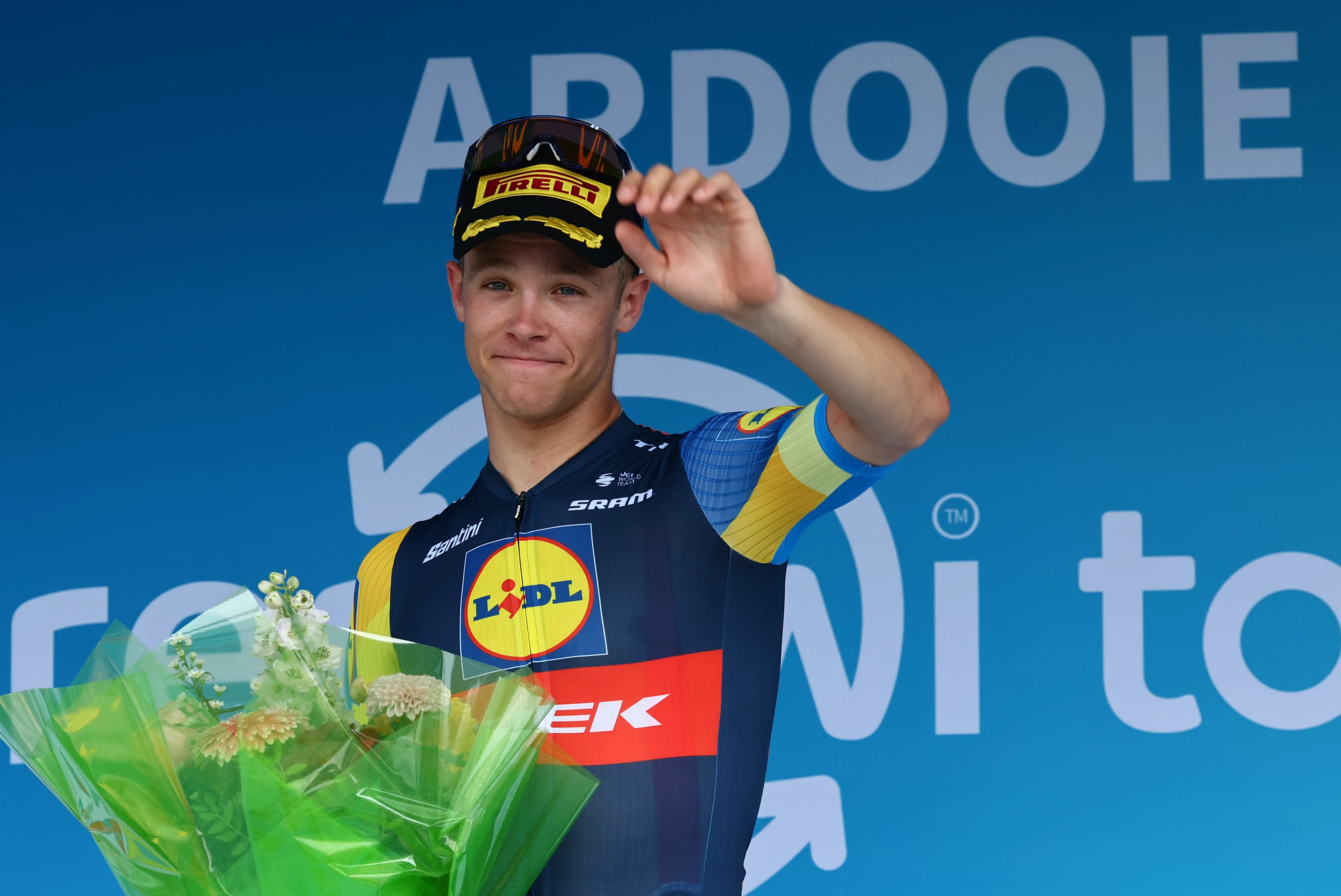 Italian Jonathan Milan of Lidl-Trek celebrates on the podium after winning the third stage of the 'Renewi Tour' multi-stage cycling race, from Blankenberge to Ardooie (185,5 km) on Friday 30 August 2024. The five-day race takes place in Belgium and the Netherlands. BELGA PHOTO DAVID PINTENS