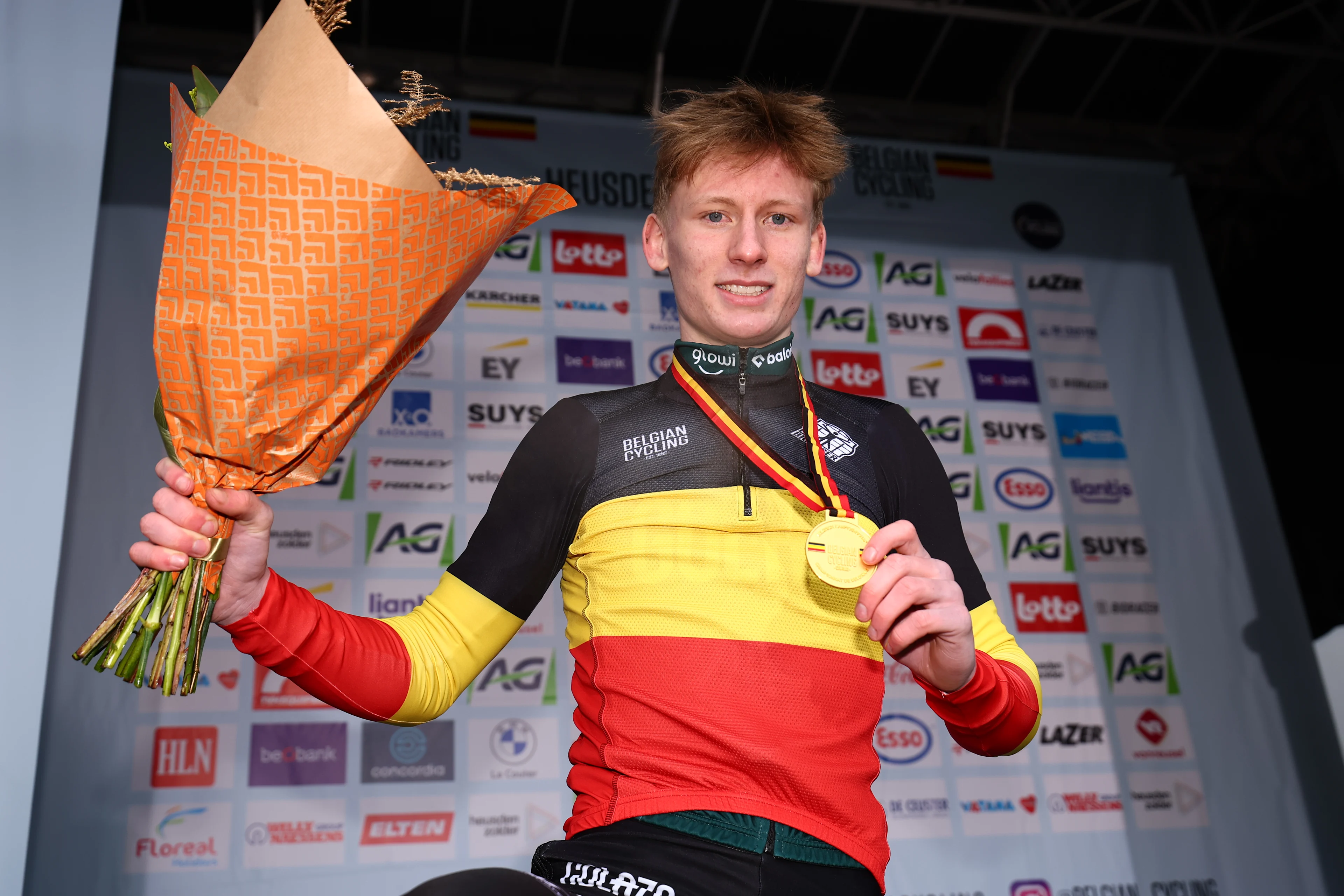 Belgian Arthur Van den Boer celebrates on the podium after winning the juniors men race of the Belgian Championships cyclocross (11-12/01) on Saturday 11 January 2025 in Heusden-Zolder. BELGA PHOTO DAVID PINTENS