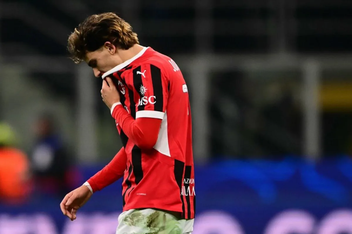 AC Milan's Portughese forward #79 Joao Félix reacts at the end of the UEFA Champions League knockout round play-off second leg football match between AC Milan and Feyenoord at San Siro stadium in Milan, on February 18, 2025. Marco BERTORELLO / AFP