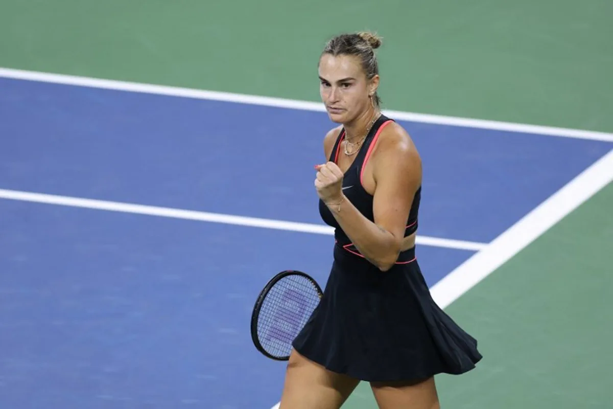 Belarus's Aryna Sabalenka celebrates a point during her women's singles third round tennis match against Canada's Leylah Fernandez on day six of the US Open tennis tournament at the USTA Billie Jean King National Tennis Center in New York City, on August 29, 2025. CHARLY TRIBALLEAU / AFP