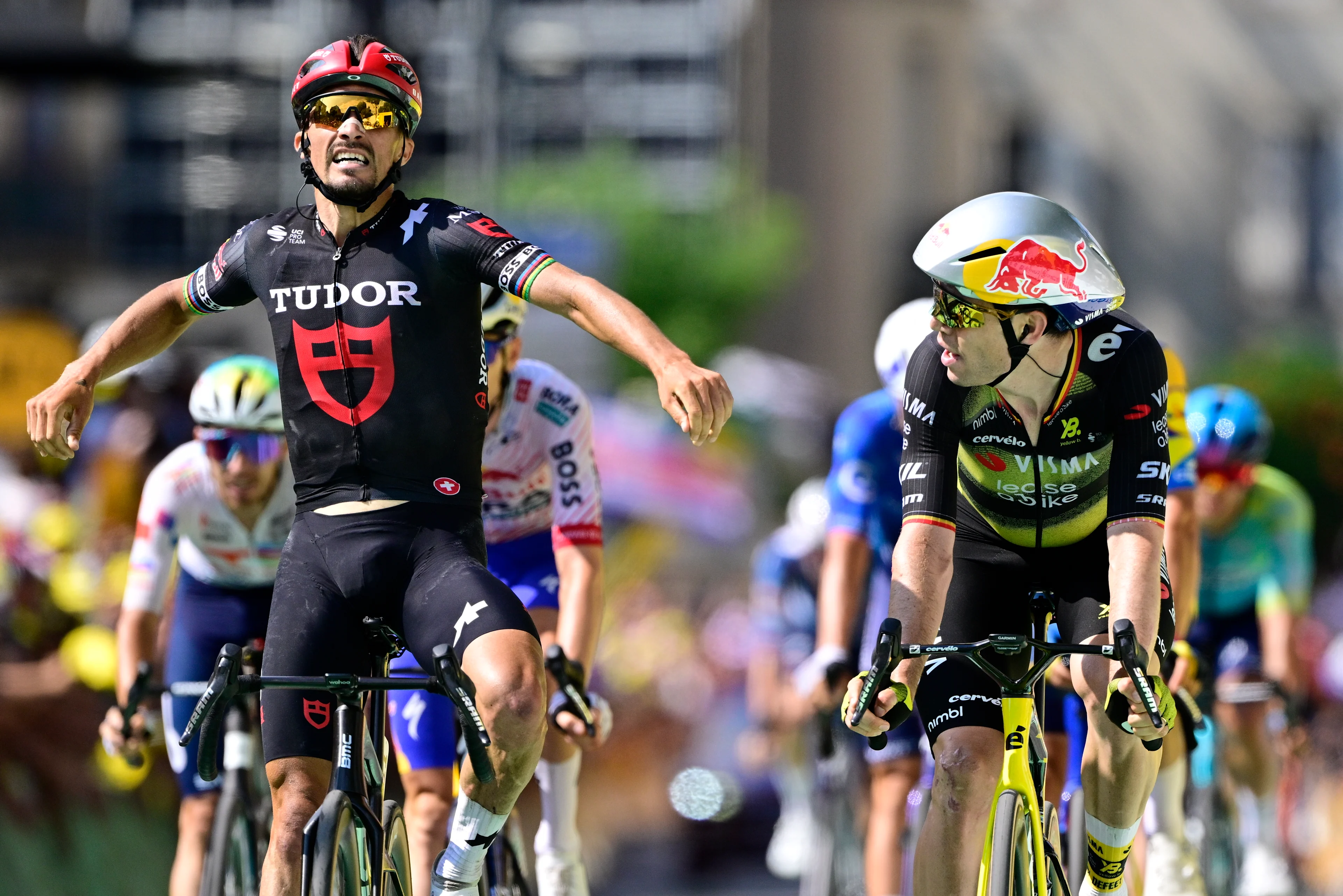 Belgian Wout van Aert of Team Visma-Lease a Bike looks at French Julian Alaphilippe of Tudor Pro Cycling Team at the finish of stage 15 of the 2025 Tour de France cycling race, from Muret to Carcasonne (169 km), on Sunday 20 July 2025 in France. The 112th edition of the Tour de France starts on Saturday 5 July in Lille, France, and will finish in Paris, France on the 27th of July. BELGA PHOTO DIRK WAEM