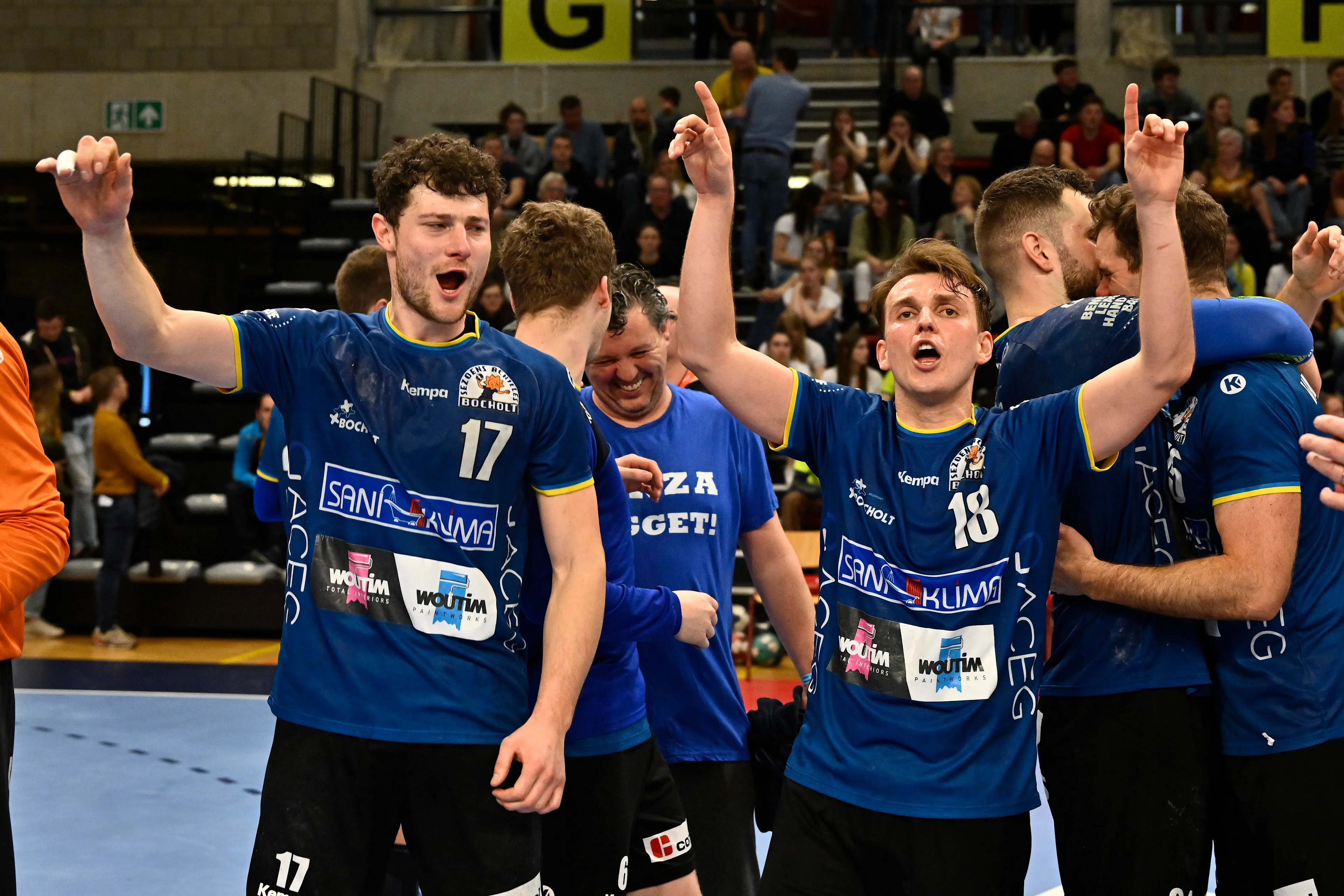 Bocholt's Joren Lamers and Bocholt's Thomas Driesen celebrate after winning a game between Achilles Bocholt and Sporting Pelt, the men's final of the Belgian handball cup, Saturday 01 April 2023, in Hasselt. BELGA PHOTO JOHAN EYCKENS