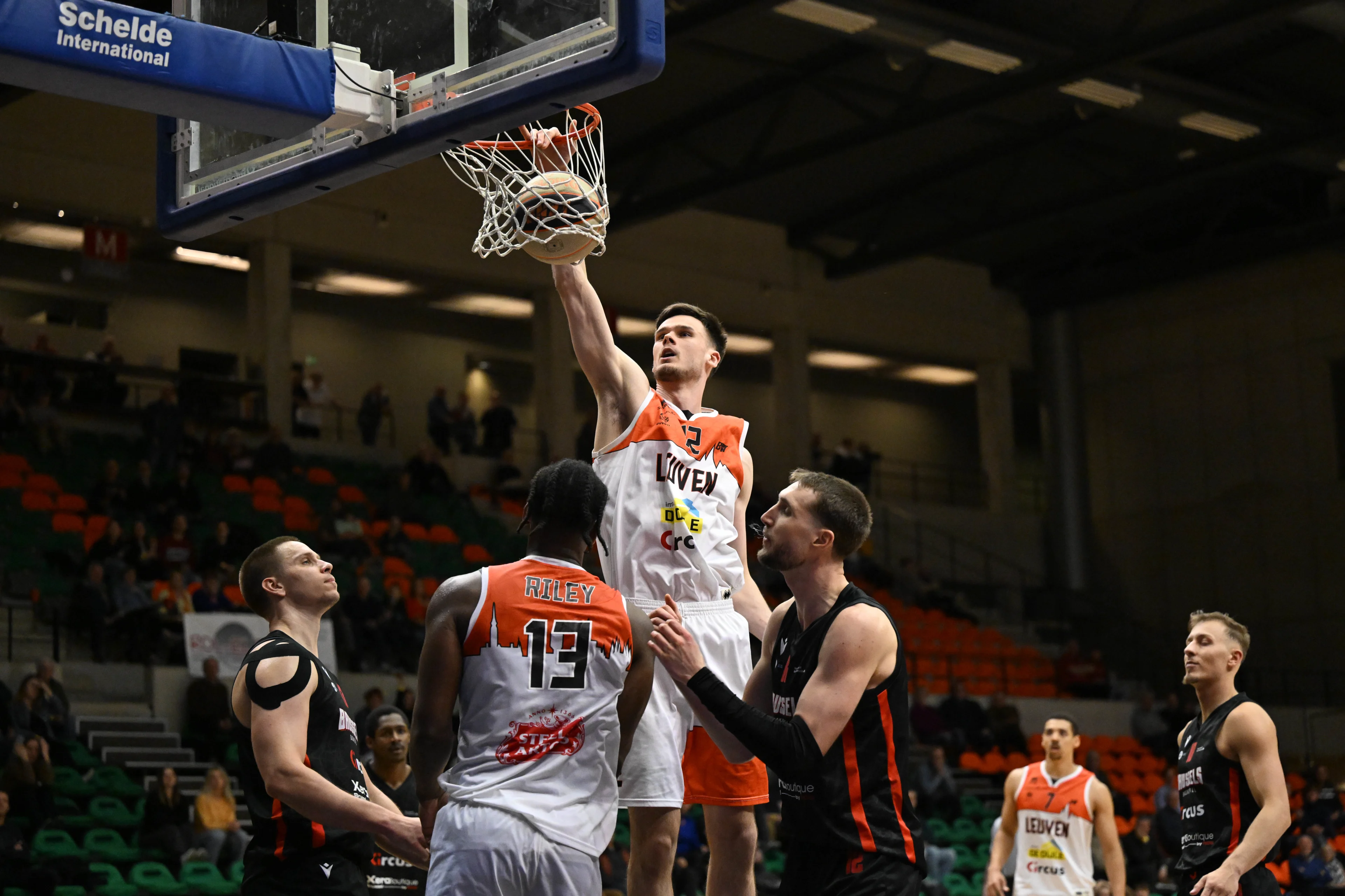 Leuven's Thibaut Vanderhaegen scoring during a basketball match between Leuven Bears and Brussels Basketball, Friday 08 March 2024 in Leuven, on day 1 in the elite Silver, cross-boarder phase of the 'BNXT League' Belgian and Netherlands first division basket championship. BELGA PHOTO JOHN THYS