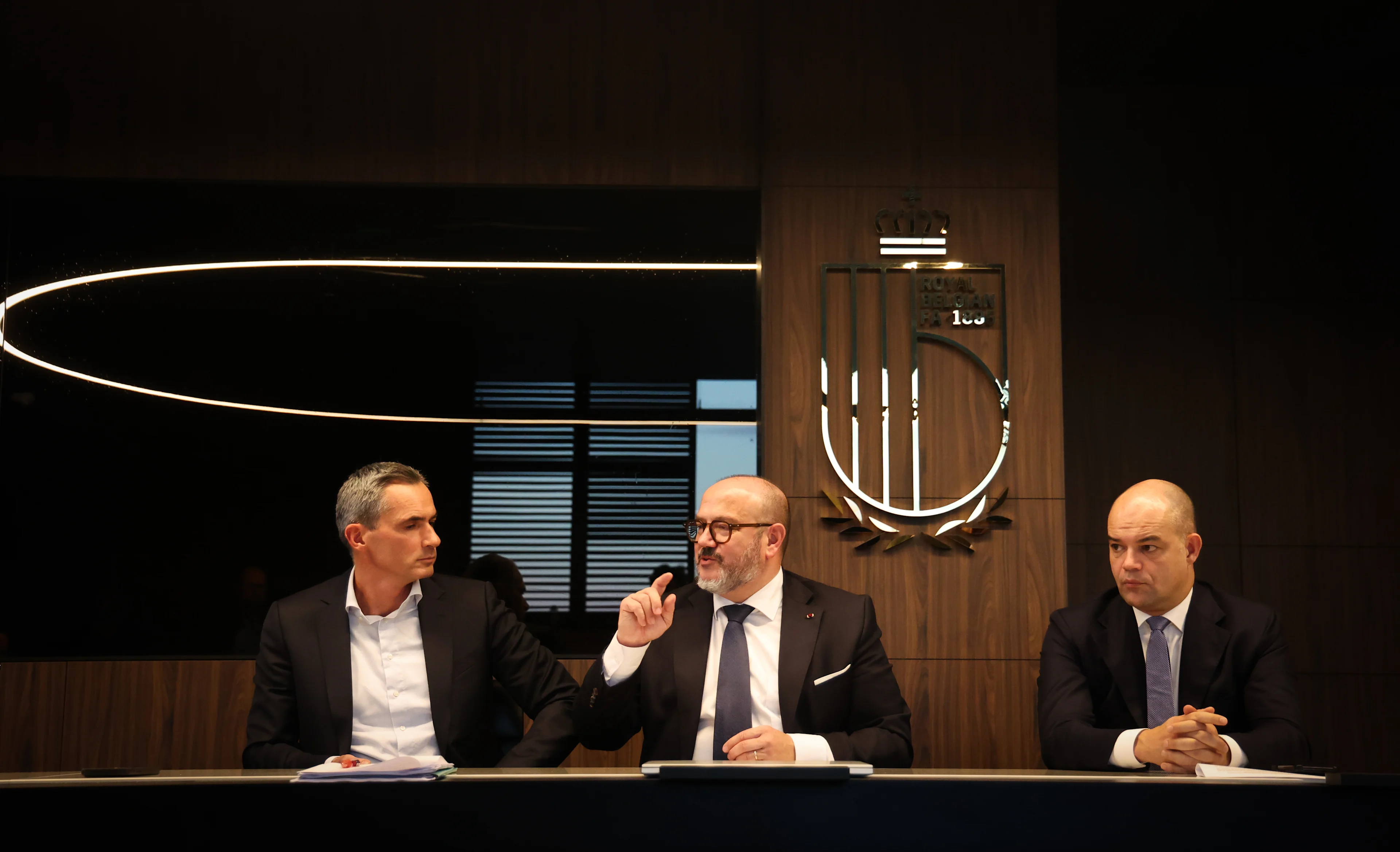 Pro League CEO Lorin Parys, Minister of Interior Bernard Quintin and Belgium soccer union CEO Peter Willems pictured during a press conference after a round table on safety in football, organised by the Pro League and the Royal Belgian Football Association (RBFA), Friday 07 November 2025 in Tubize. BELGA PHOTO VIRGINIE LEFOUR