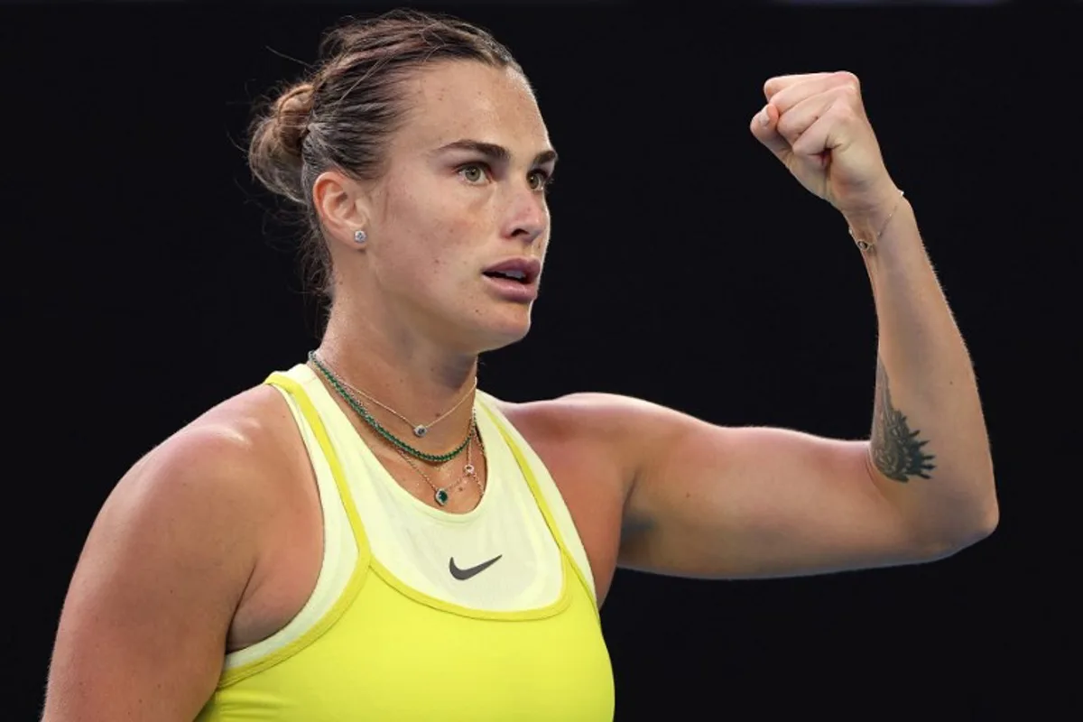 Belarus' Aryna Sabalenka reacts to a point against Russia's Anastasia Pavlyuchenkova during their women's singles quarterfinal match on day ten of the Australian Open tennis tournament in Melbourne on January 21, 2025.  Martin KEEP / AFP