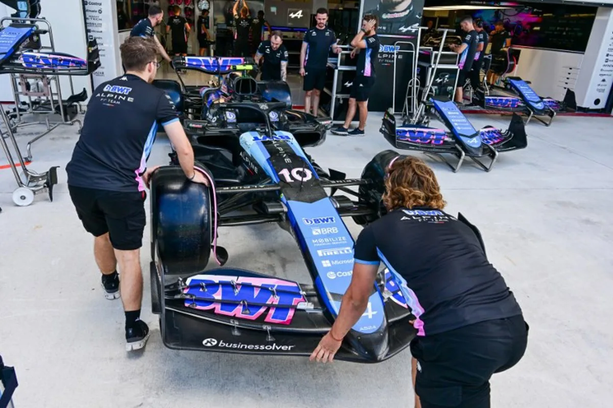 Alpine technicians work on the cars ahead of the 2024 Miami Formula One Grand Prix at Miami International Autodrome in Miami Gardens, Florida, on May 2, 2024.   GIORGIO VIERA / AFP