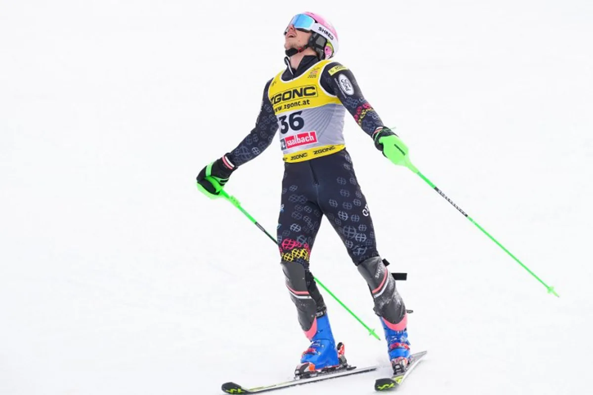 Belgium's Sam Maes reacts in the finish area after competing in the second run of the Men's Slalom event of the Saalbach 2025 FIS Alpine World Ski Championships in Hinterglemm on February 16, 2025.  Dimitar DILKOFF / AFP