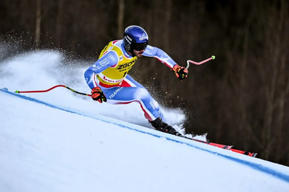 France's Cyprien Sarrazin skies during a training session before crashing ahead of the Men's downhill race of the FIS Alpine Skiing World Cup event, in Bormio on December 27, 2024. Cyprien Sarrazin suffered a heavy fall on December 27 during the second training session before the World Cup downhill in Bormio (Italy) which he won just a year ago. Fabrice COFFRINI / AFP