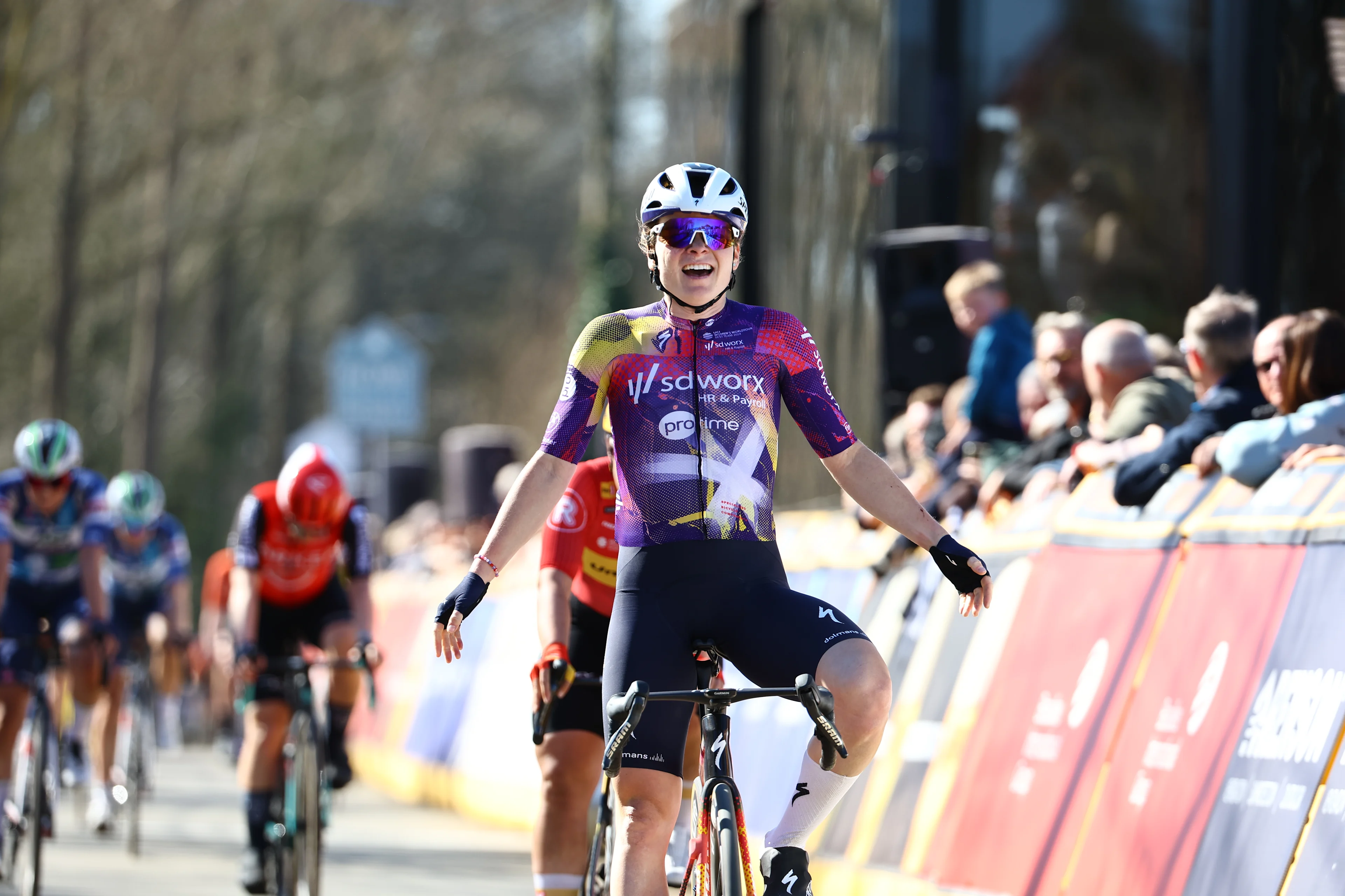 Polish Marta Lach of SD Worx-Protime celebrates as she crosses the finish line to win the 'Nokere Koerse' one day cycling race for women elite, 134km from Deinze to Nokere, on Wednesday 19 March 2025. BELGA PHOTO DAVID PINTENS