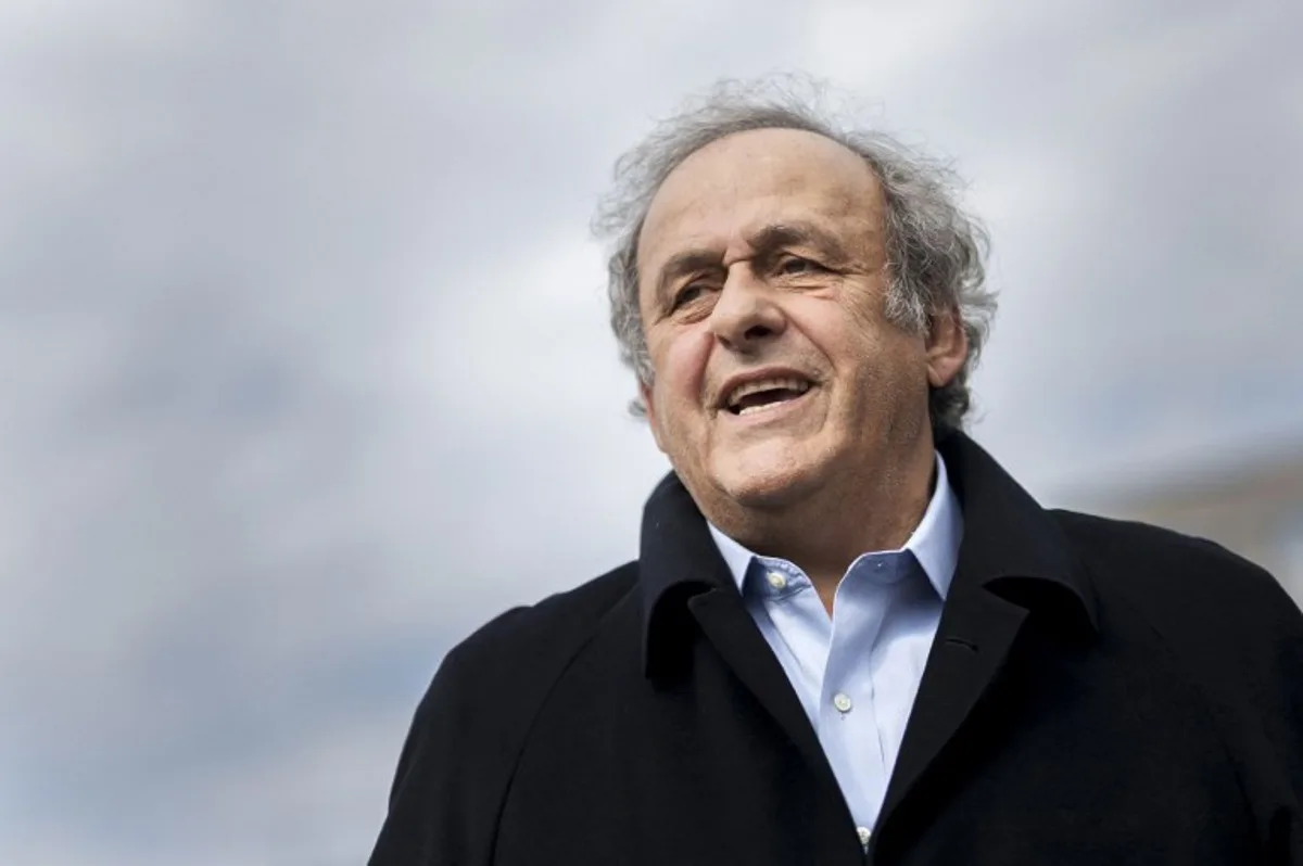 Former UEFA president Michel Platini looks on when leaving the courthouse after the verdict of an appeal by Swiss Attorney General's office against former UEFA and FIFA presidents over a suspected fraudulent payment, in Muttenz near Basel, on March 25, 2025. Former FIFA president Sepp Blatter and ex-UEFA chief Michel Platini were acquitted again on March 25, 2025 on appeal by a Swiss court in a long-running corruption case. Fabrice COFFRINI / AFP