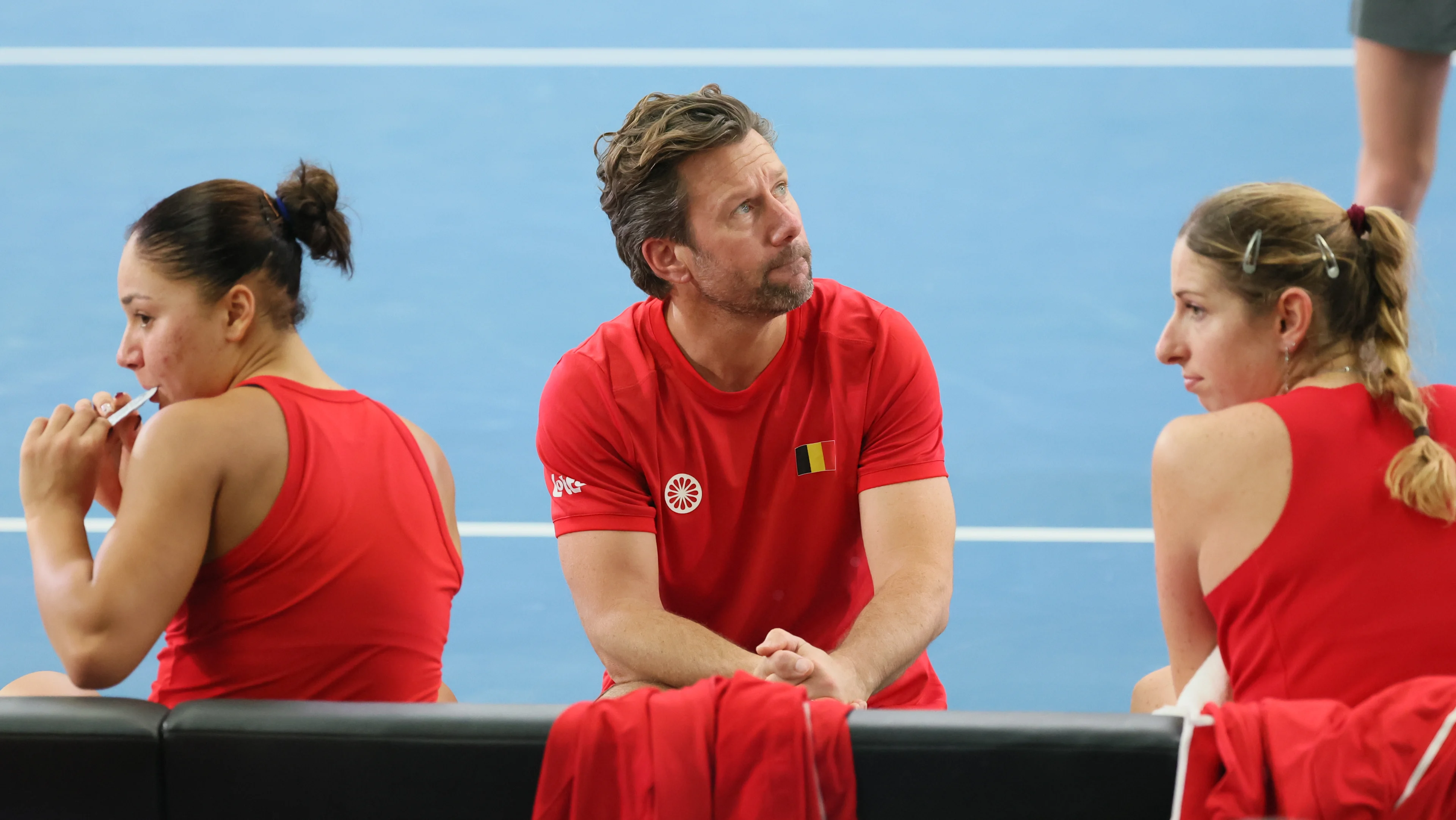 Belgian Sofia Costoulas, Belgian team captain Wim Fissette and Belgian Magali Kempen pictured during the third game, a double game between Belgian pair Costoulas-Kempen and Turkish pair Aksu-Oz, in the Billie Jean King Cup Play-offs, between Belgium and Turkey, on Saturday 15 November 2025 in Ismaning, Germany. PHOTO BENOIT DOPPAGNE