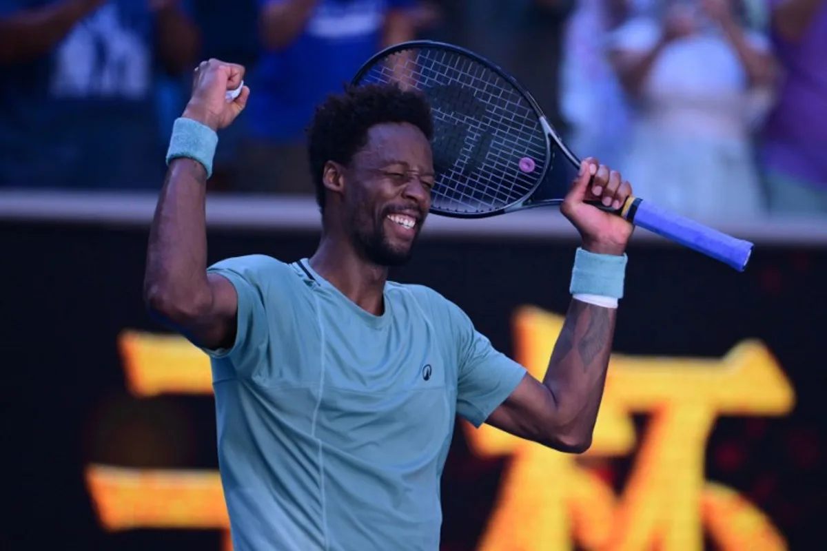 France's Gael Monfils celebrates beating USA's Taylor Fritz in their men's singles match on day seven of the Australian Open tennis tournament in Melbourne on January 18, 2025.  Yuichi YAMAZAKI / AFP