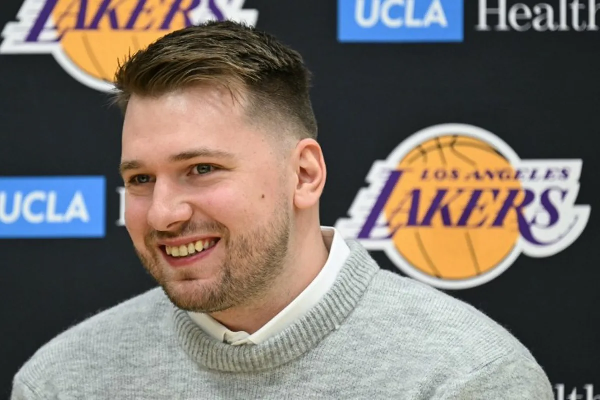 Slovenian basketball player Luka Doncic speaks during a press conference introducing him as the newest member of the Los Angeles Lakers, at the UCLA Health Training Center, in El Segundo, California on February 4, 2025. Slovenian star Luka Doncic said February 2, 2025 he thought he'd spend his entire NBA career in Dallas, thanking fans in Texas for making it feel like home a day after the Mavericks abruptly traded him to the Los Angeles Lakers. Patrick T. Fallon / AFP