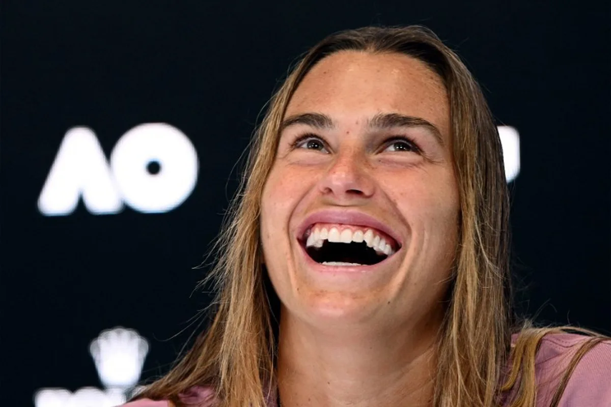 This handout picture released by the Tennis Australia on January 19, 2025 shows Belarus' Aryna Sabalenka speaks at a press conference after her women's singles match against Russia's Mirra Andreeva at the Australian Open tennis tournament in Melbourne.   Vince CALIGIURI / TENNIS AUSTRALIA / AFP