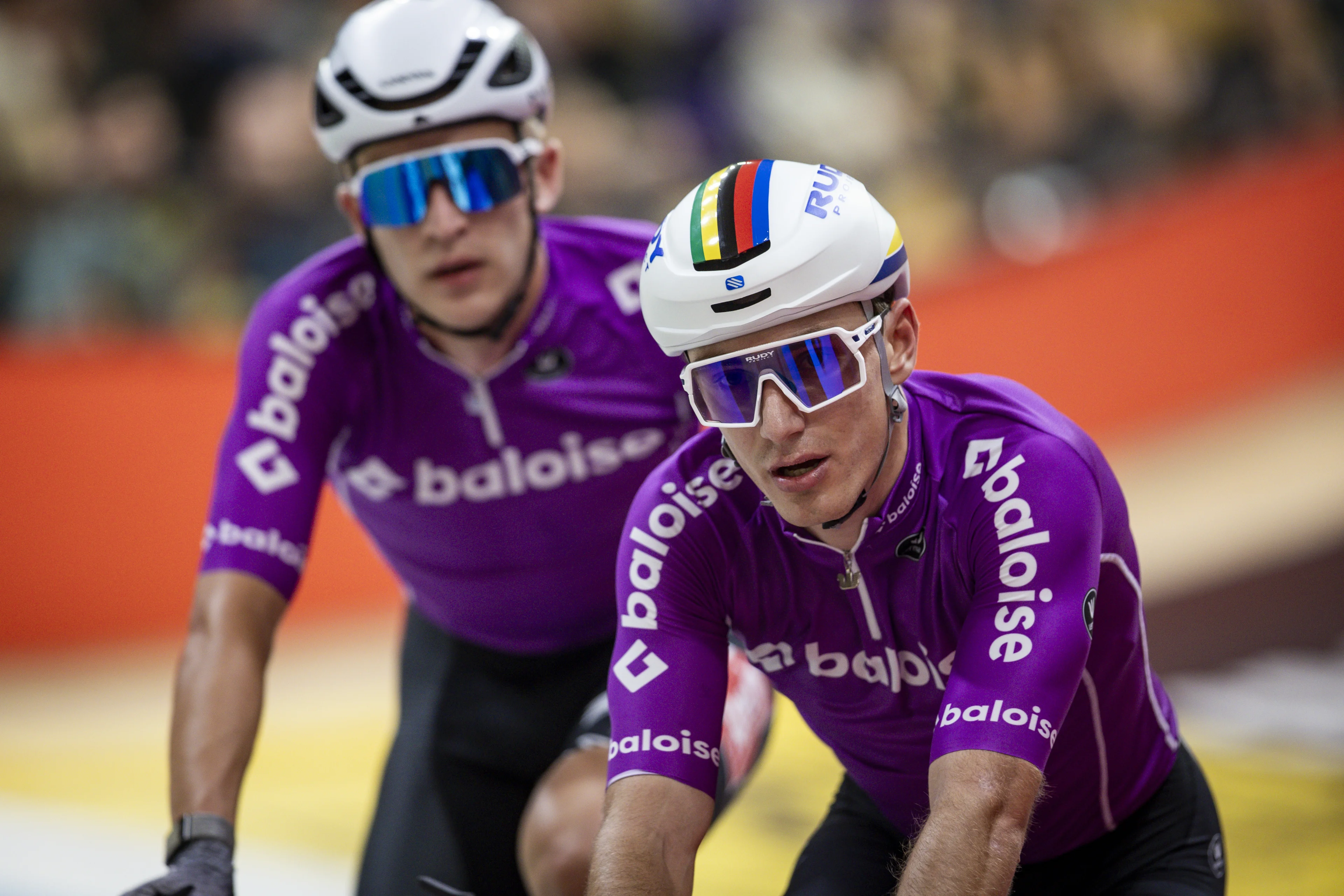 Belgian Lindsay De Vylder and Belgian Robbe Ghys pictured in action during the first day of the Zesdaagse Vlaanderen-Gent six-day indoor track cycling event at the indoor cycling arena 't Kuipke, Tuesday 12 November 2024, in Gent. BELGA PHOTO DAVID PINTENS