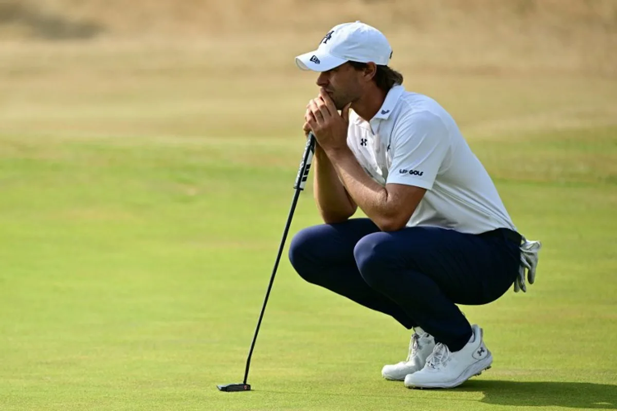 Belgium's Thomas Detry lines up a putt on the 18th green on day two of the 154th Open Golf championship at Royal Birkdale Golf Club near Southport in north-west England on July 17, 2026. Ben STANSALL / AFP