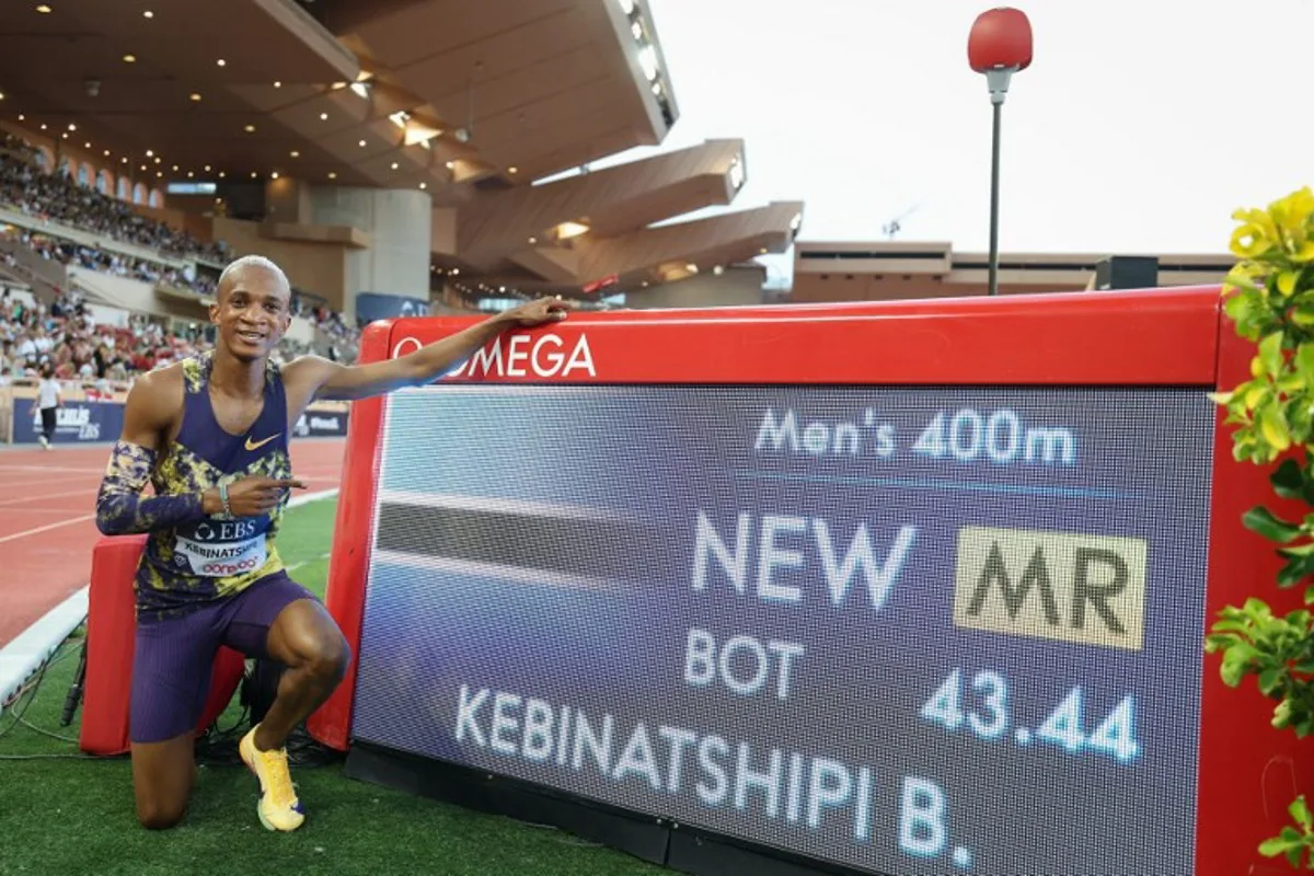 Botswana's Busang Collen Kebinatshipi celebrates after setting a new meeting record after winning the men's 400m during the Diamond League athletics meeting at the Stade Louis II in Monaco on July 10, 2026. Valery HACHE / AFP