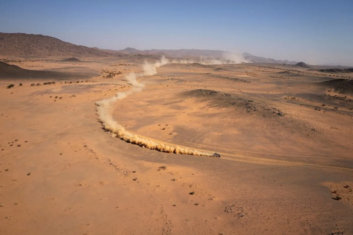 A driver competes in stage 2B of the 47th Dakar Rally between Bisha and Bisha, on January 6, 2025.  Valery HACHE / AFP