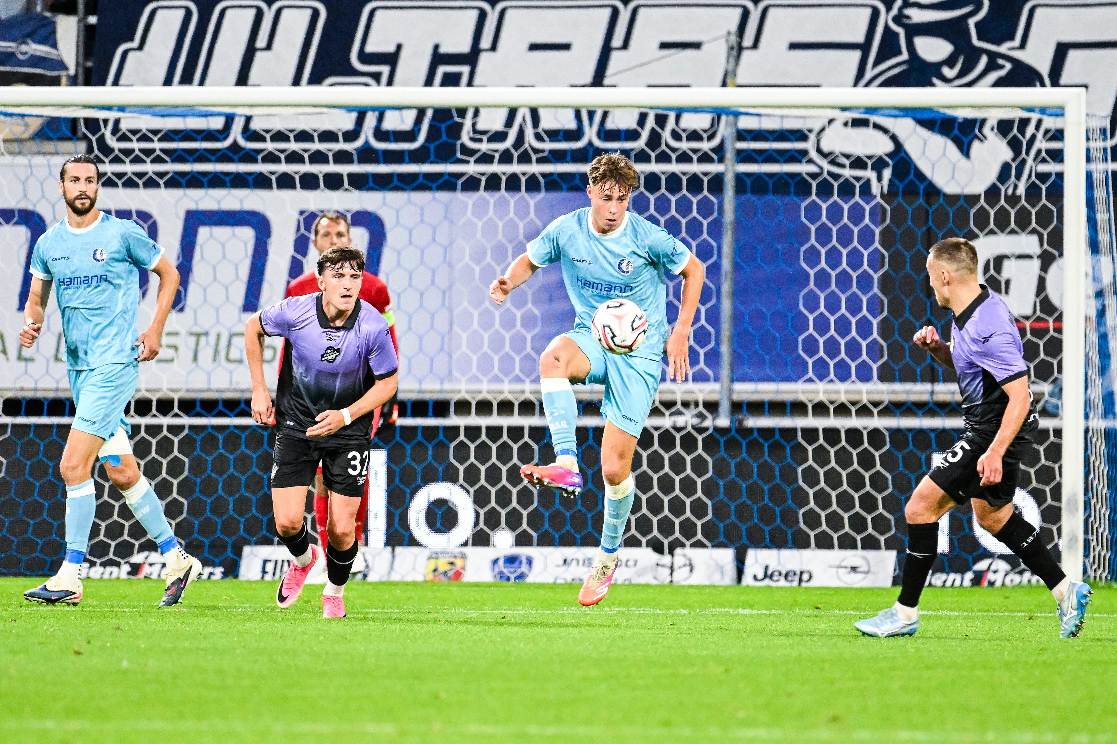 Gent's Tibe De Vlieger and Hibernian's Felix Passlack pictured in action during a soccer game between Belgian KAA Gent and Scottish Hibernian FC, Thursday 20 August 2026 in Gent, the first leg of the play-off round for the UEFA Conference League group phase. BELGA PHOTO TOM GOYVAERTS