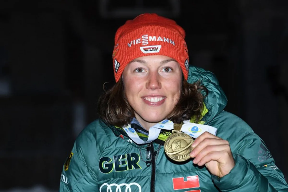 Third placed Germany's Laura Dahlmeier celebrates during the medal ceremony of the women's 10km pursuit competition at the IBU Biathlon World Championships in Ostersund, Sweden, on March 10, 2019. Jonathan NACKSTRAND / AFP
