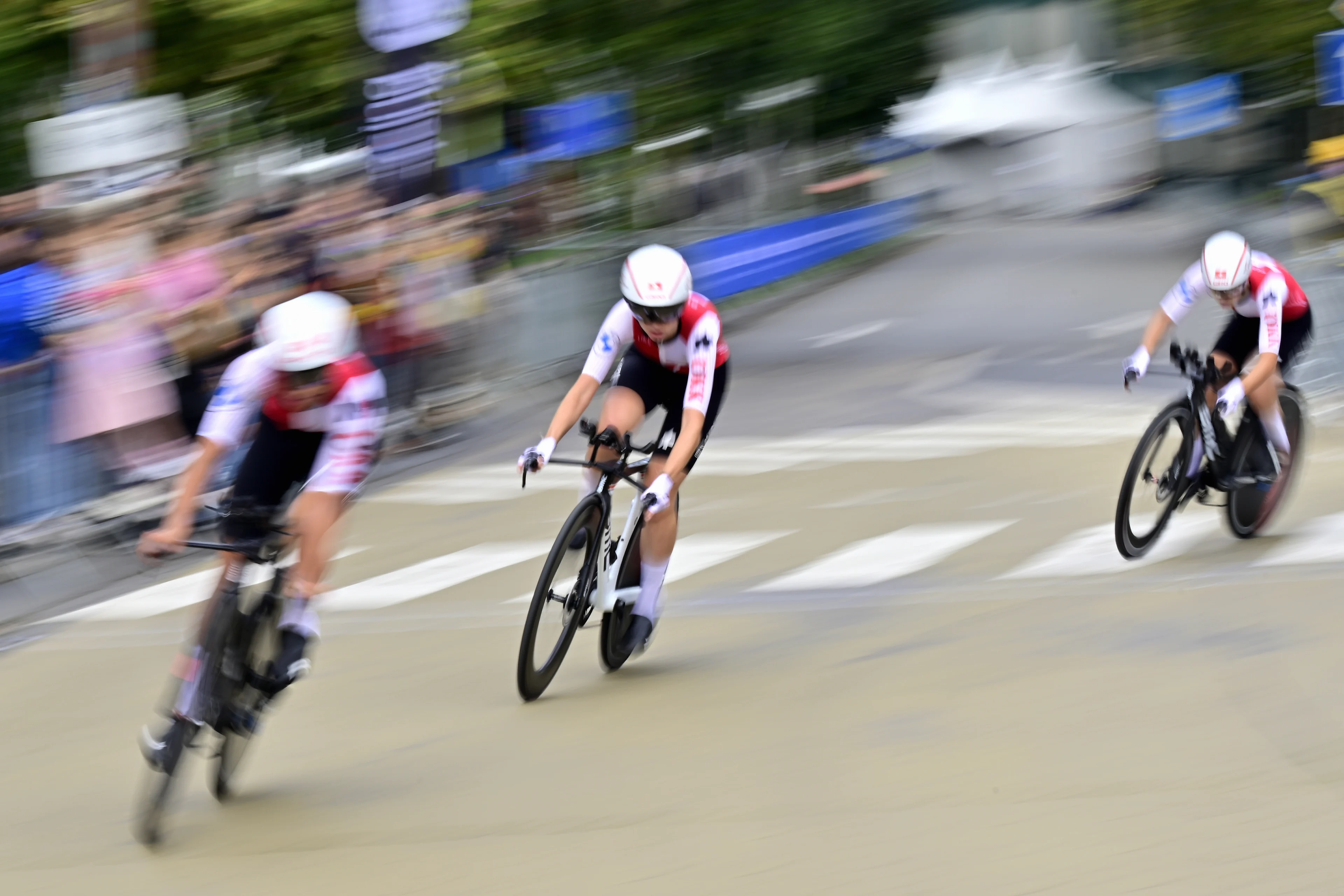 Swiss Female Team Muriel Furrer, Noemie Gret and Chiara Mettier pictured in action during the time trial mixed relay juniors at the European Championship 2024, in Hasselt, Thursday 12 September 2024. The UEC Road European Championships 2024 will take place from 11 to 15 september in Limburg, Belgium. BELGA PHOTO DIRK WAEM