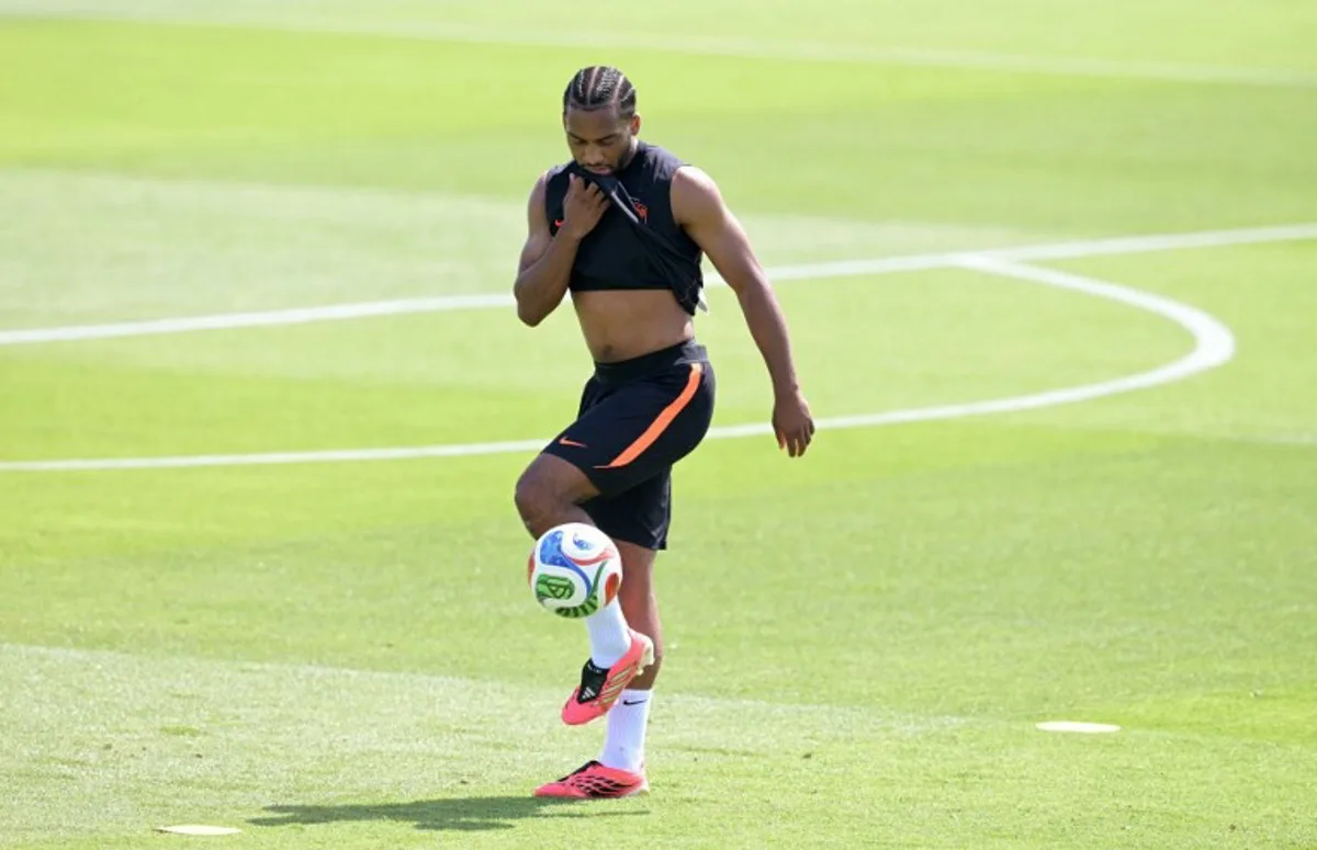 Netherlands' midfielder #26 Quinten Timber controls the ball during a training session at KC Current Training Facility in Kansas City on June 10, 2026, ahead of the 2026 World Cup football tournament. JUAN MABROMATA / AFP