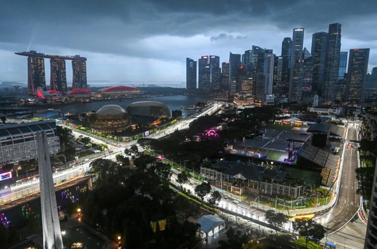 This photo shows the road circuit illuminated for the the upcoming Formula One Singapore Grand Prix at the Marina Bay Street Circuit in Singapore on October 1, 2025. Roslan RAHMAN / AFP