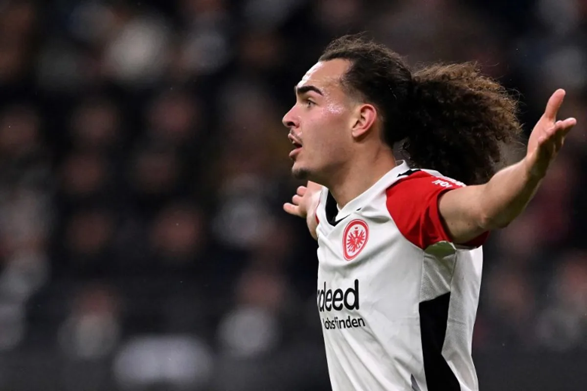 Frankfurt's Belgian defender #03 Arthur Theate reacts during the German first division Bundesliga football match between Eintracht Frankfurt and Mainz 05 in Frankfurt on December 21, 2024.  Kirill KUDRYAVTSEV / AFP