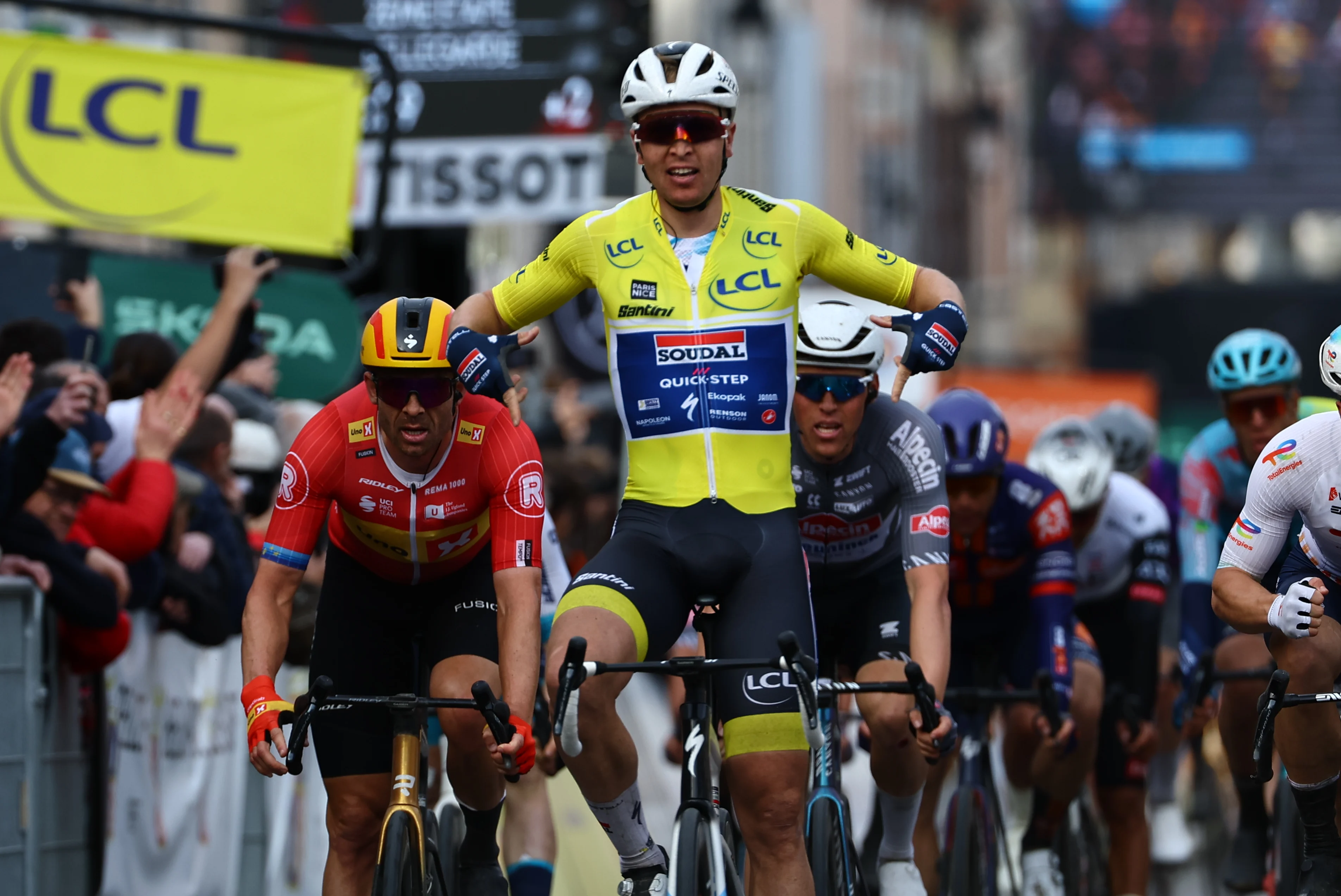 Belgian Tim Merlier of Soudal Quick-Step celebrates as he crosses the finish line to win stage two of the 83th edition of the Paris-Nice cycling race, from Montesson to Bellegarde (183,9 km) in France, Monday 10 March 2025. BELGA PHOTO DAVID PINTENS