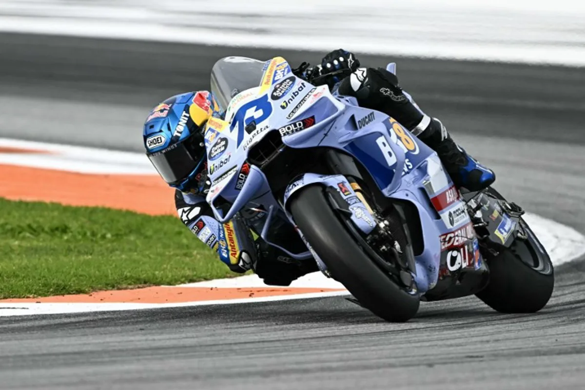 BK8 Gresini Racing MotoGP team's Spanish MotoGP rider Alex Marquez competes in the sprint race ahead of the MotoGP Valencia Grand Prix at the Ricardo Tormo racetrack in Cheste on November 15, 2025. JOSE JORDAN / AFP