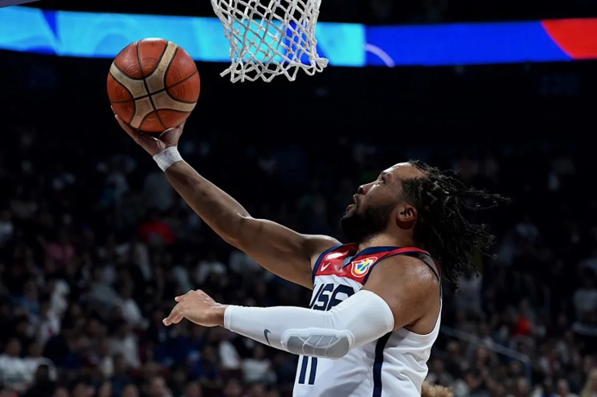 USA's Jalen Brunson goes for a layup during the FIBA Basketball World Cup second round match between USA and Lithuania at Mall of Asia Arena in Pasay City, suburban Manila on September 3, 2023.  JAM STA ROSA / AFP