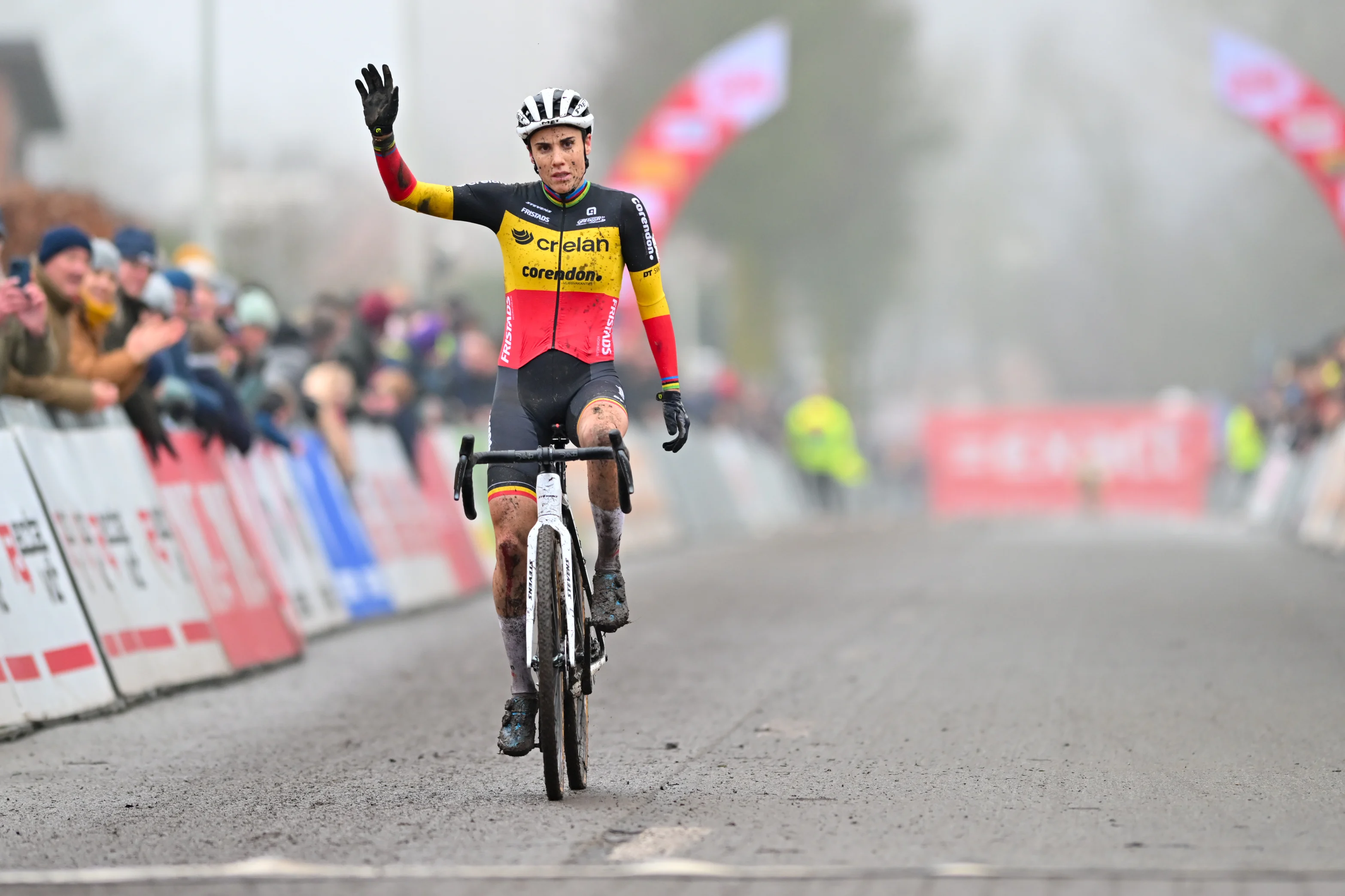 Belgian Sanne Cant crosses the finish line at the women's elite race of the cyclocross cycling event, race 5/7 in the 'Exact Cross' competition, Friday 27 December 2024 in Loenhout. BELGA PHOTO BILLY CEUSTERS