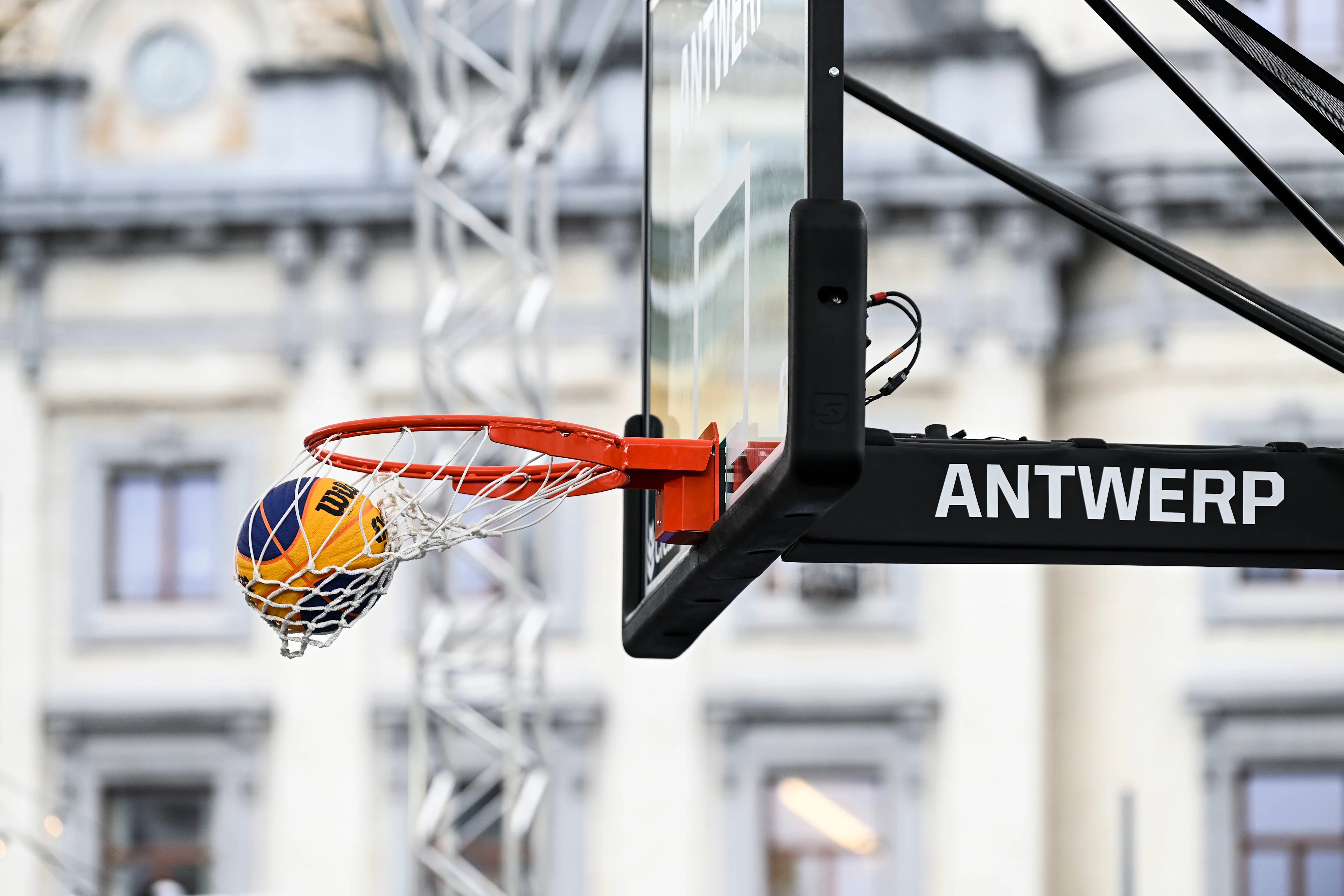 Illustration picture shows a 3x3 basketball going through the hoop during a 3x3 basketball game between Canada and the United States of America, in the Women's quarter final round at the FIBA 2022 world cup, Saturday 25 June 2022, in Antwerp. The FIBA 3x3 Basket World Cup 2022 takes place from 21 to 26 June in Antwerp. BELGA PHOTO TOM GOYVAERTS