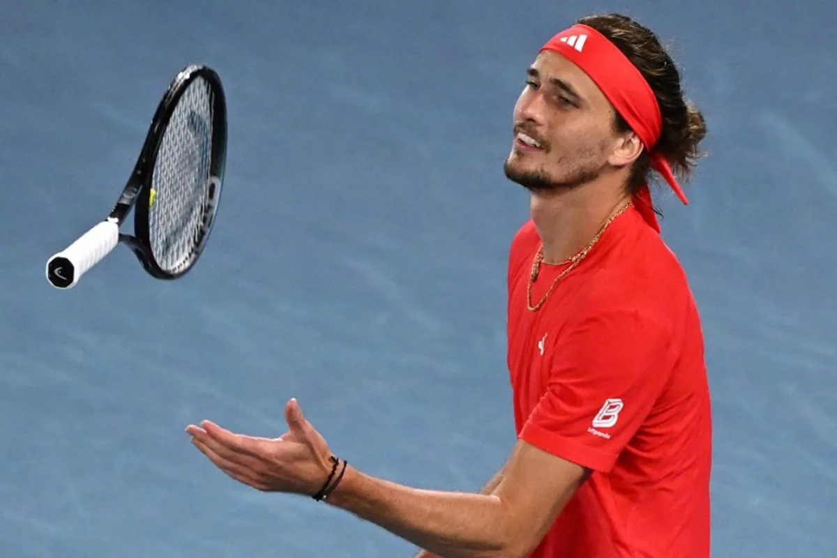 Germany's Alexander Zverev throws his racket in air between points against Spain's Pedro Martinez during their men's singles match on day four of the Australian Open tennis tournament in Melbourne on January 15, 2025.  WILLIAM WEST / AFP