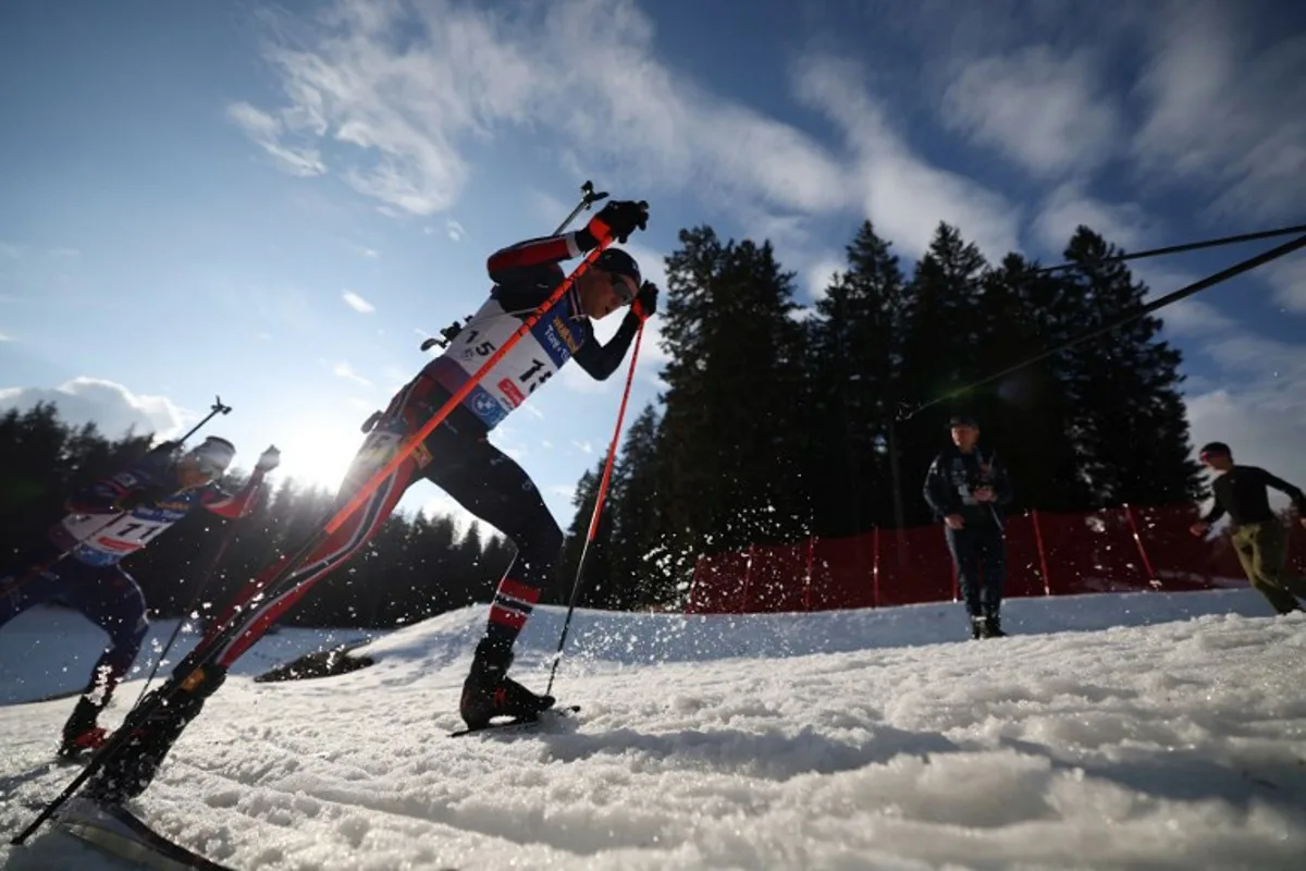 Norway's Endre Stroemsheim competes during the Men 15km Mass Start event of the IBU Biathlon World Championship of Lenzerheide, eastern Switzerland, on February 23, 2025.  FRANCK FIFE / AFP