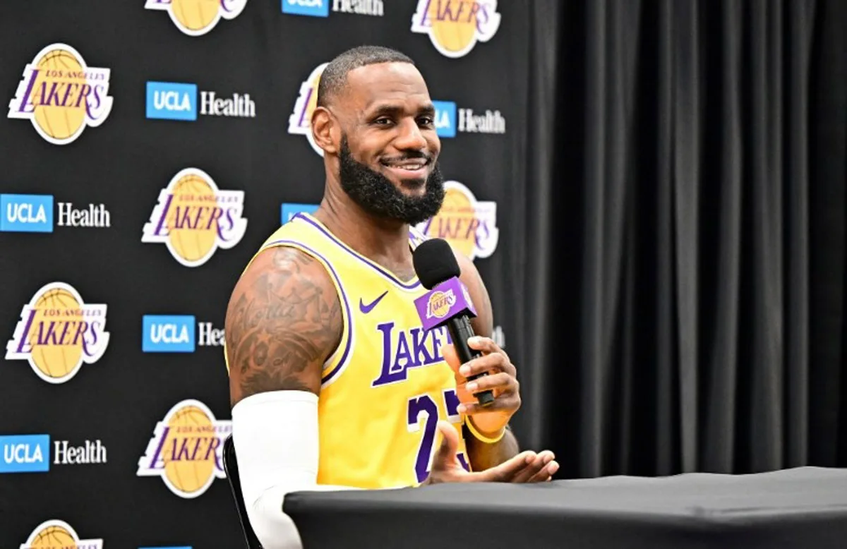 Los Angeles Lakers #23 LeBron James speaks to the press during the Lakers media day at UCLA Health Training Center in El Segundo, California, September 30, 2024.  Frederic J. BROWN / AFP