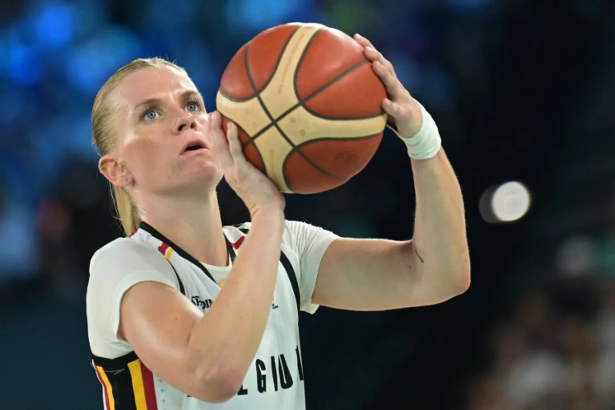 Belgium's #35 Julie Vanloo takes a free throw in the women's Bronze Medal basketball match between Belgium and Australia during the Paris 2024 Olympic Games at the Bercy  Arena in Paris on August 11, 2024.  Damien MEYER / AFP