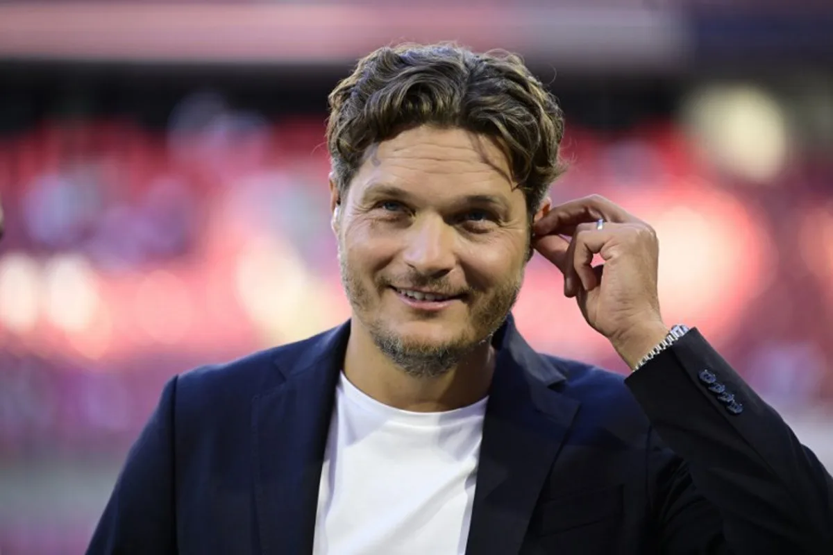 German former player and coach Edin Terzic reacts as he acts as TV expert prior to the start of the 2026 World Cup qualifiers Europe zone group A football match between Germany and Northern Ireland on September 7, 2025 in Cologne, western Germany.  INA FASSBENDER / AFP